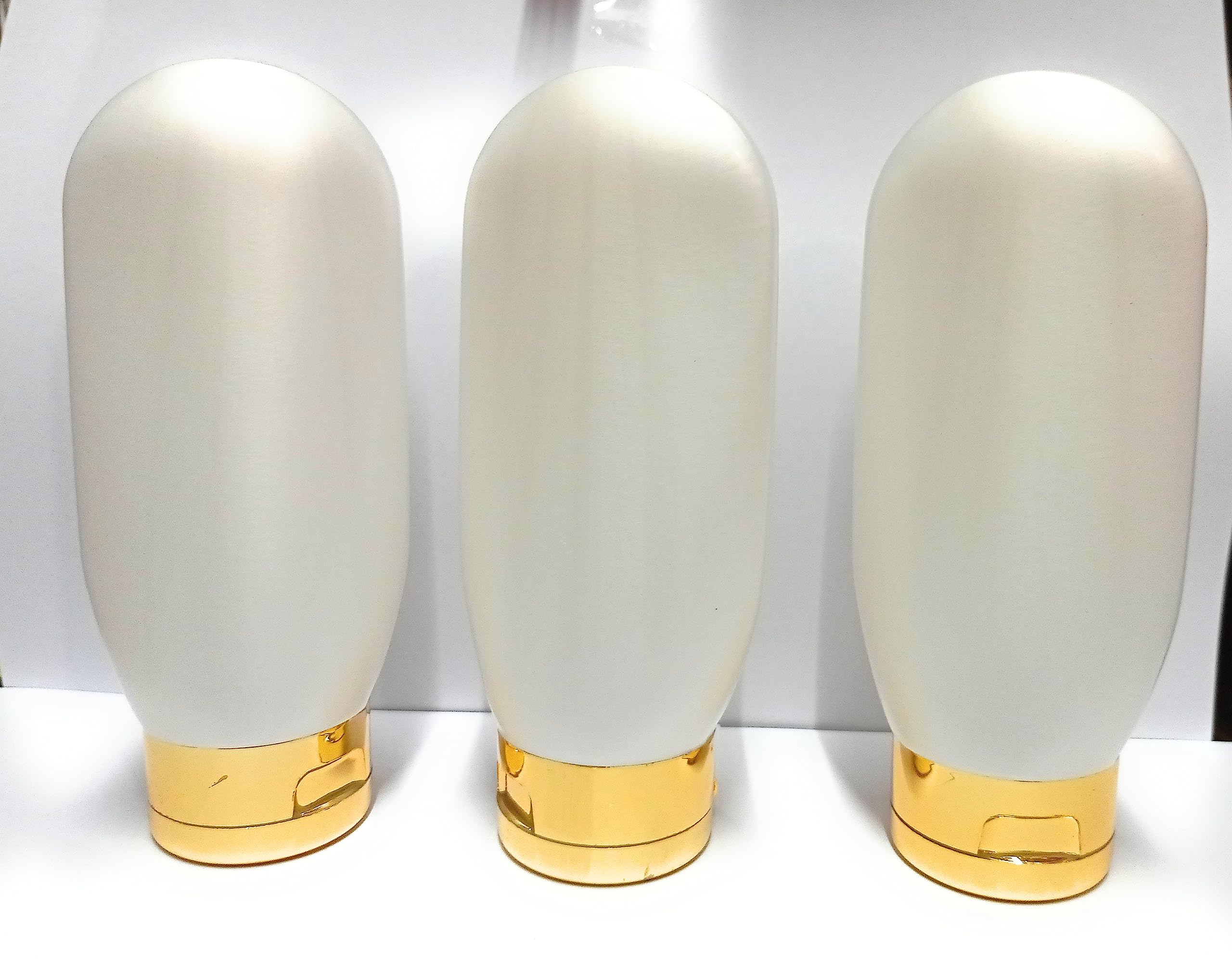 Refillable 50ml Gold Metalized Travel Toiletries Bottles - Leakproof Squeeze Tubes for DIY Lotion, Shampoo, Sunscreen & Cosmetics | Pack of 6 | Perfect for Air Travel, Gym Bags & Vacation Essentials