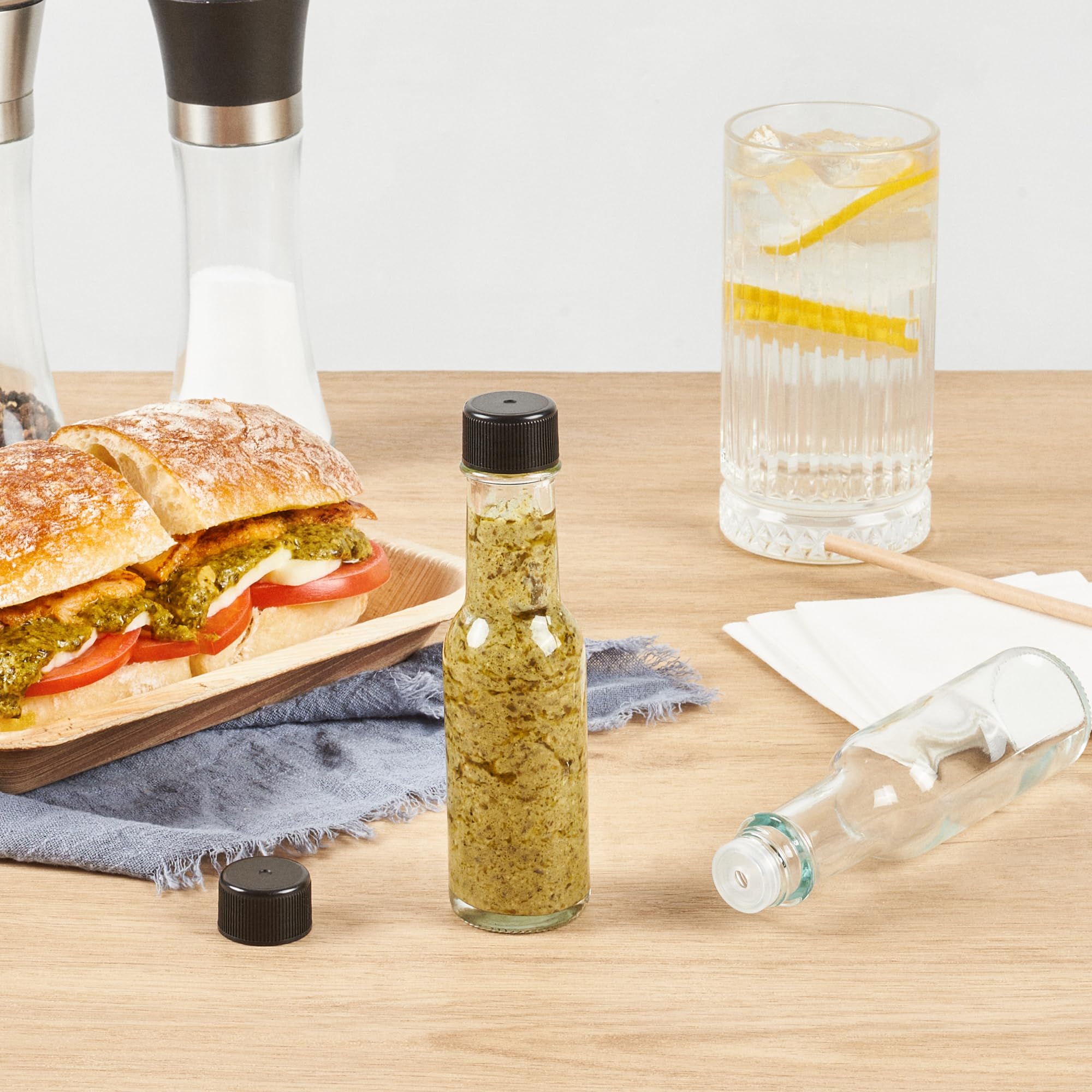 **Vetri 3 oz Clear Glass Woozy Bottles (10-Pack) with Black Caps – Dishwasher Safe & Durable Empty Sauce Bottles for Hot Sauce, BBQ, Salad Dressing, Oil, Tinctures – Perfect for Restaurants, Catering & Home Kitchens**