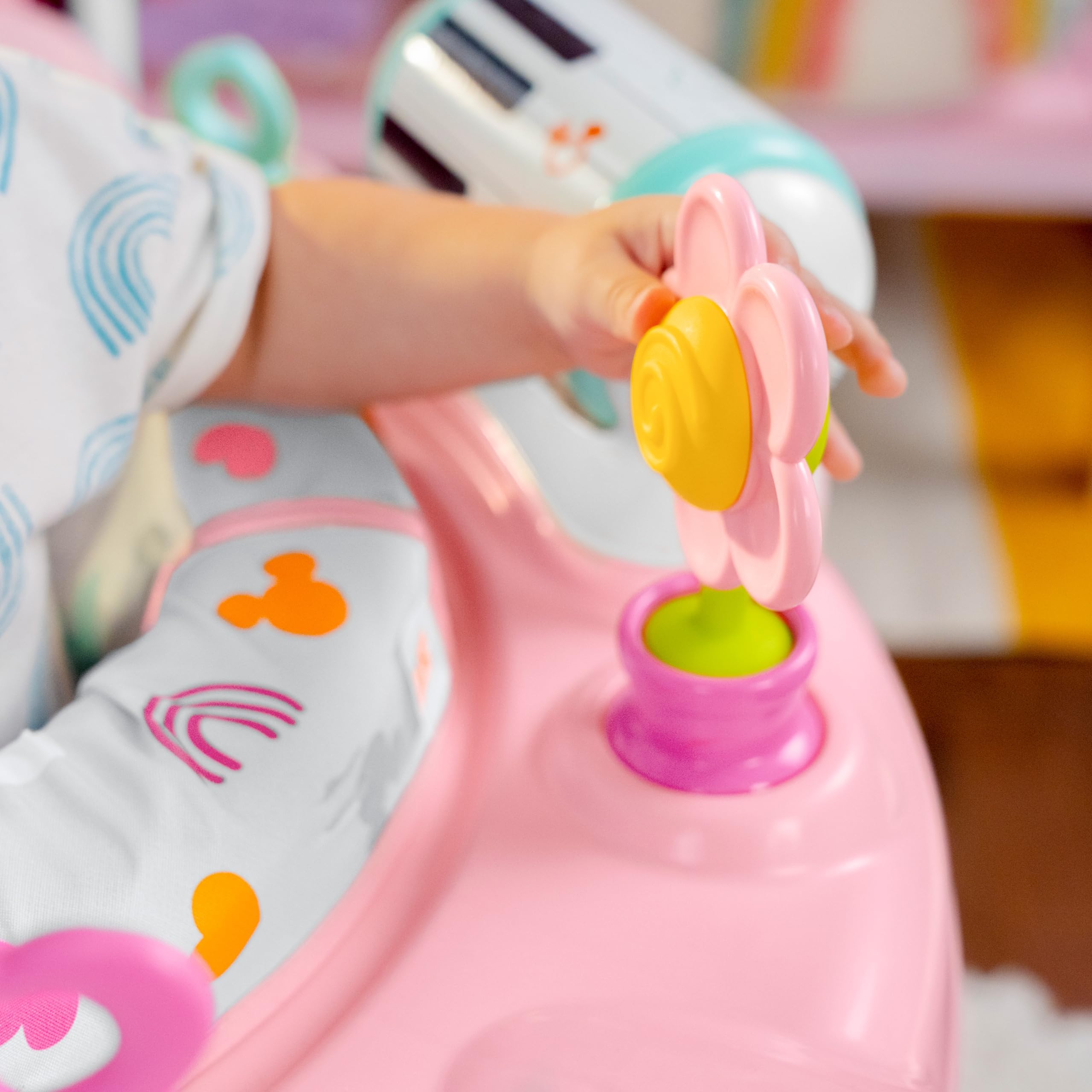 Bright Starts Disney Baby Minnie Mouse Forever Besties Baby Activity Jumper with 10 Interactive Toys, Lights & Sounds, 360-Degree Rotating Seat for Infants 6-12 Months (Pink) - Perfect for Playtime, Learning & Motor Skill Development