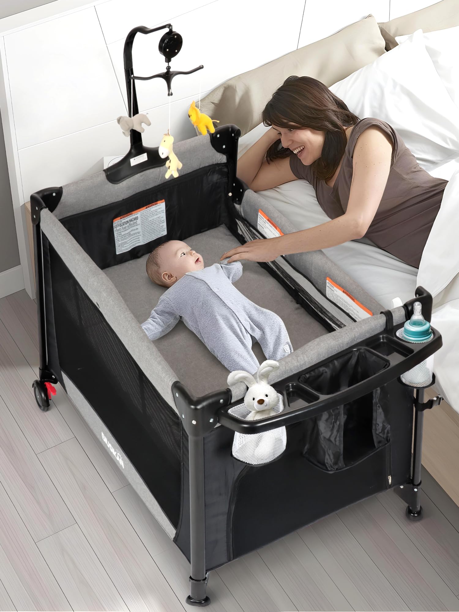 Portable Baby Bassinet & Playard with Mosquito Net, Music Box & Diaper Changer - Easy One-Click Installation Crib for Newborns to Toddlers - Perfect for Nursery, Travel & Bedside Sleeping