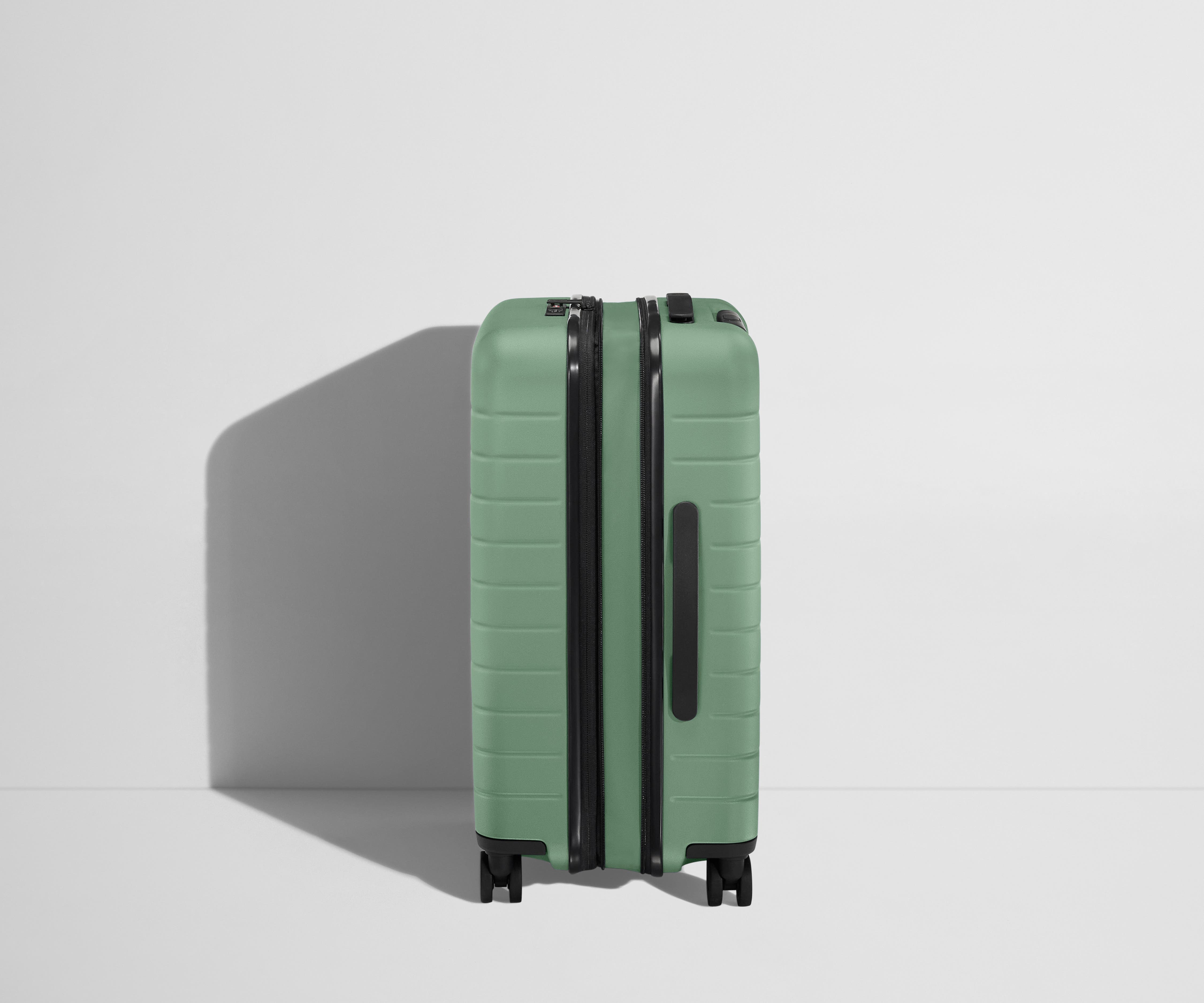 The Bigger Carry On Flex Luggage - Lightweight Expandable Suitcase in Sea Green for Travel & Business Trips
