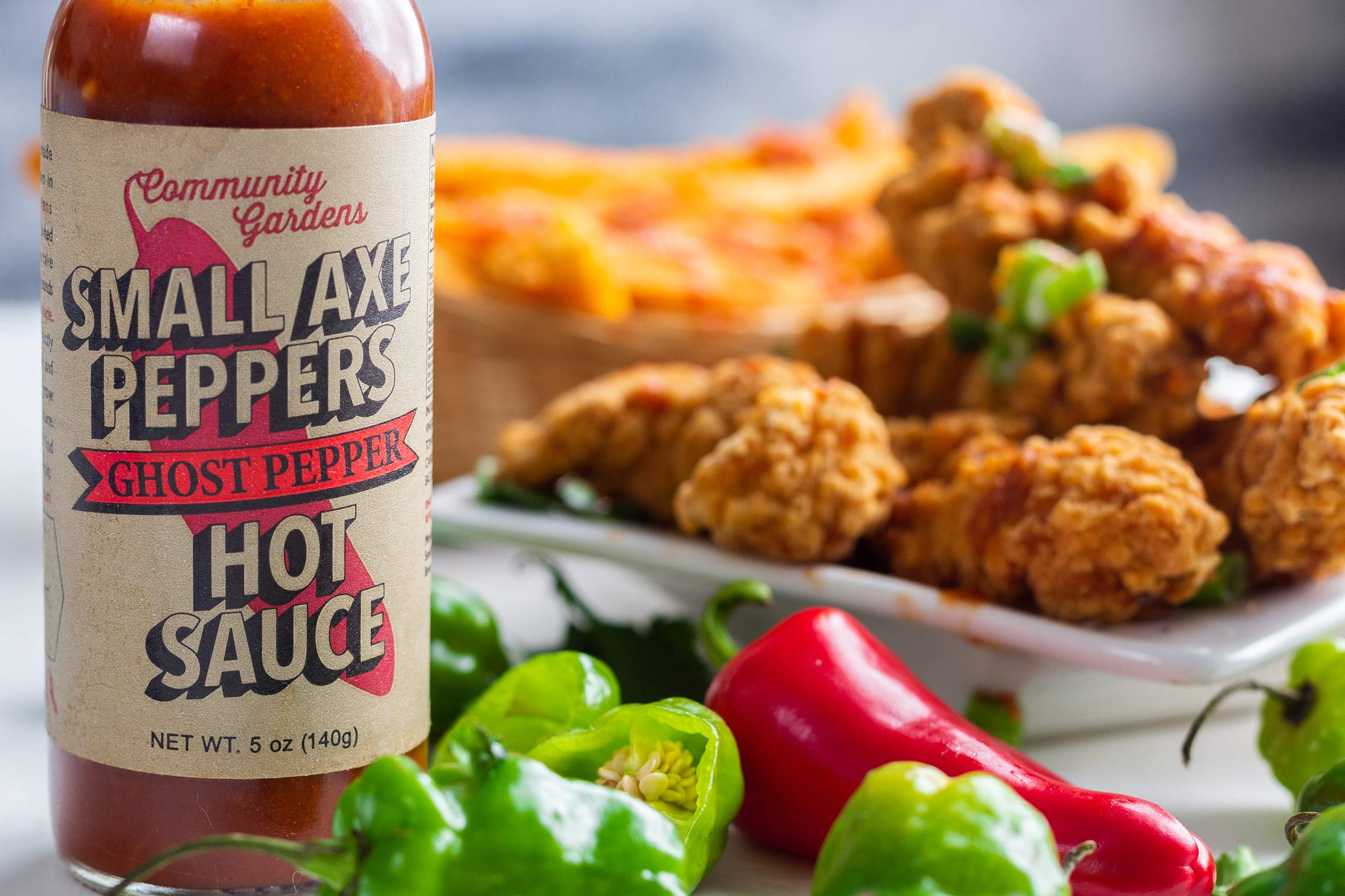 Small Axe Peppers Gourmet Hot Sauce Set - 3 Pack (5 oz Each) | All Natural, Kosher, Non-GMO, Community Garden Grown | Ghost Pepper, Habanero Ginger & Habanero Mango Flavors | Featured on HOT ONES | Perfect for Wings, Tacos, Burgers & Spicy Food Lovers