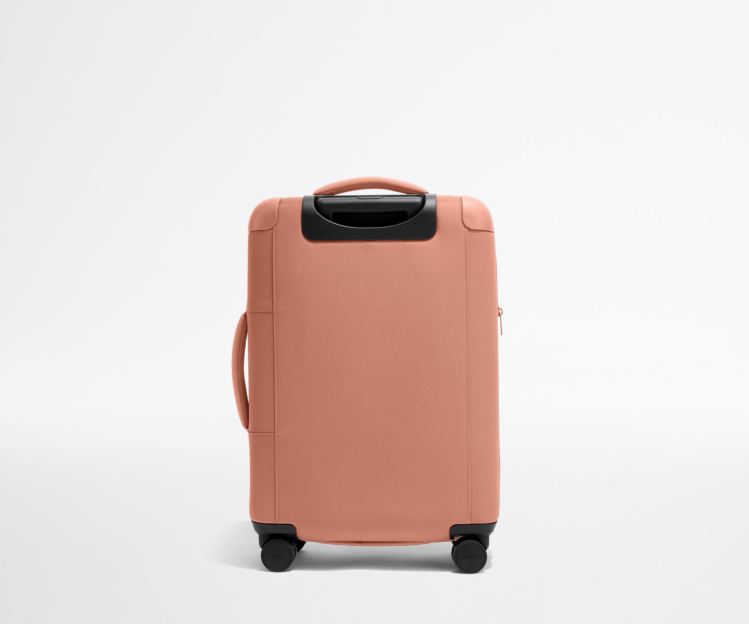 Softside Bigger Carry On Luggage in Clay Pink - Lightweight Spinner Suitcase for Women & Men, Perfect for Air Travel & Weekend Getaways