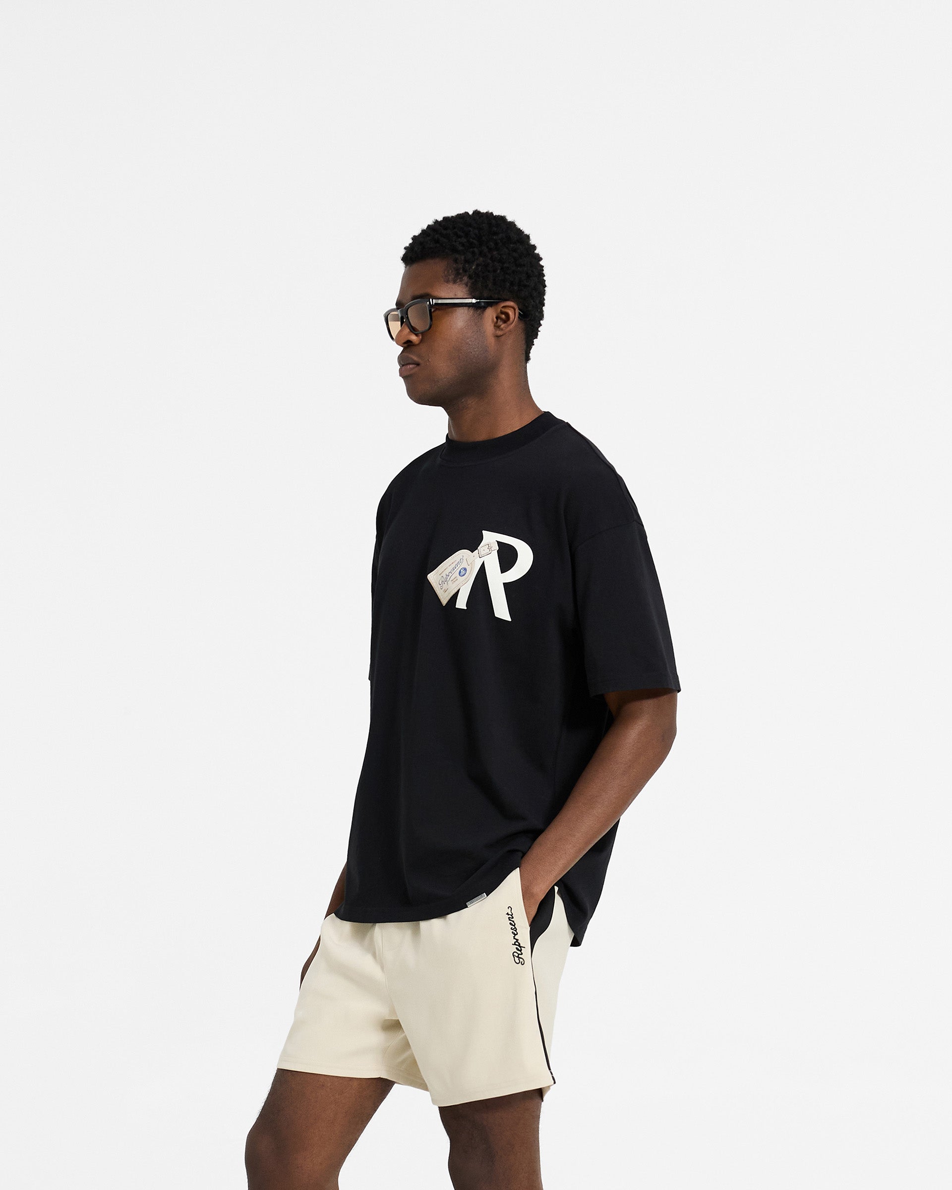 Jet Black Luggage Tag T-Shirt - Stylish & Durable Travel Apparel for Airports & Vacations