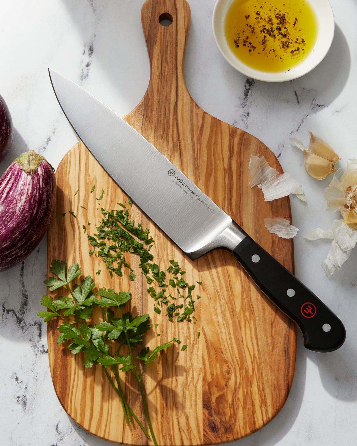 Wusthof Classic 8-Inch Chef's Knife - High Carbon Stainless Steel Kitchen Knife for Professional Chefs & Home Cooking - Perfect for Chopping, Slicing & Dicing Vegetables, Meat & Herbs
