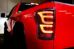 07-13 Toyota Tundra LUXX Series LED Tail Lights - Smoked Black - High Performance Brake Lights for Night Driving & Off-Road Adventures
