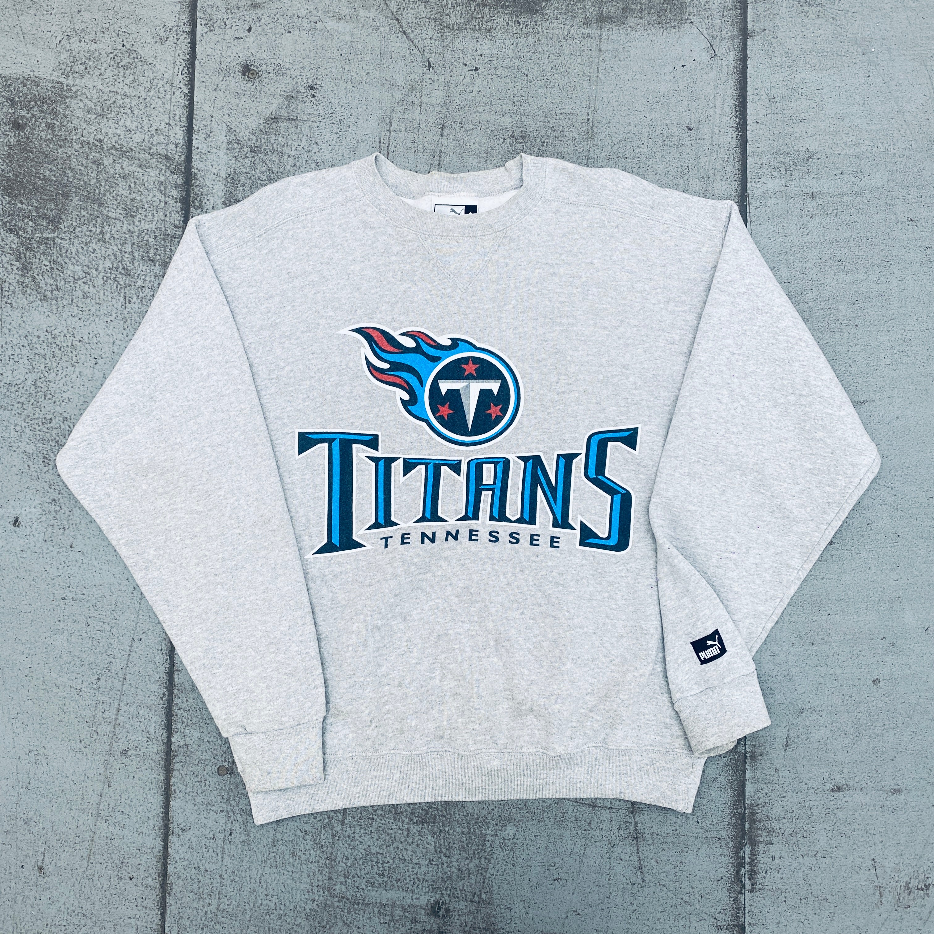 Tennessee Titans 1999 Puma Graphic Spellout Sweatshirt - Large Size - Vintage NFL Fan Apparel for Men & Women - Perfect for Game Day, Tailgating, and Casual Wear