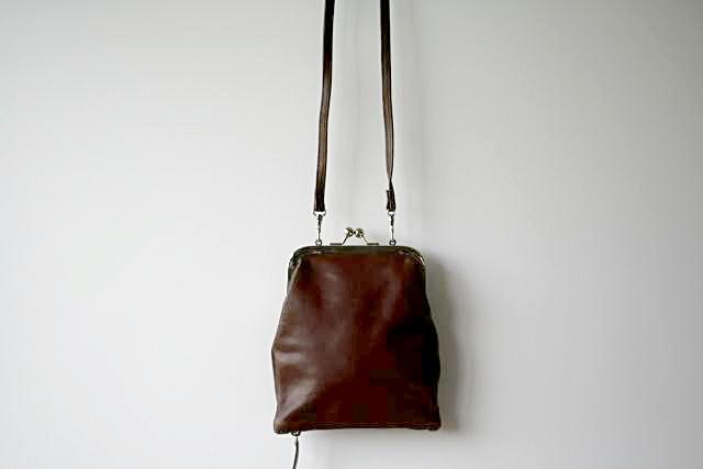 Stylish Frame & Zip Slouch Pouch in Chocolate Brown - Perfect for Travel, Gym, and Everyday Essentials Organization