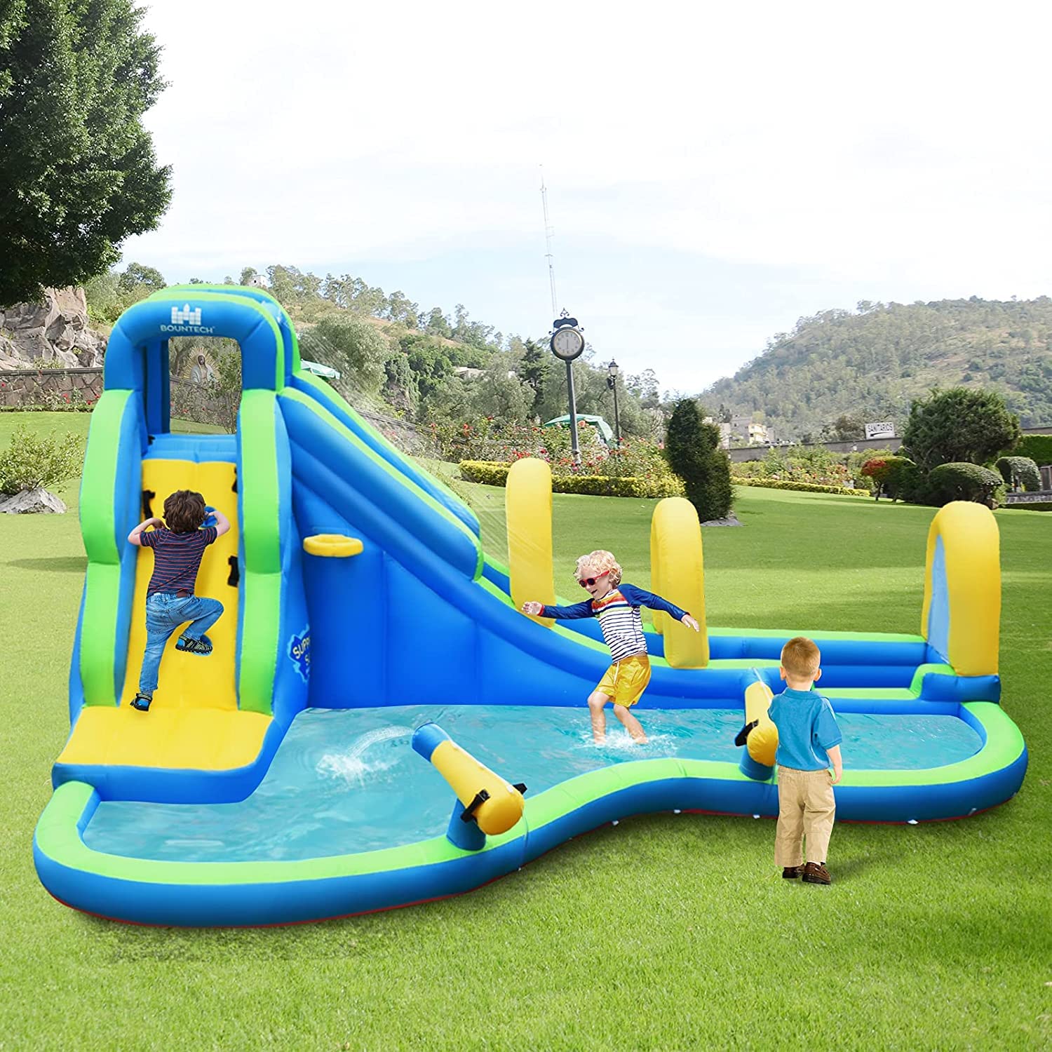 **HONEY JOY 5-in-1 Inflatable Water Slide Park with Water Cannons & Long Slide - Indoor/Outdoor Bouncy Castle for Kids & Adults - Backyard Summer Fun (Includes 750W Blower)**    **Perfect for:** Backyard parties, summer gatherings, family fun, kids' birthdays, and outdoor water play.