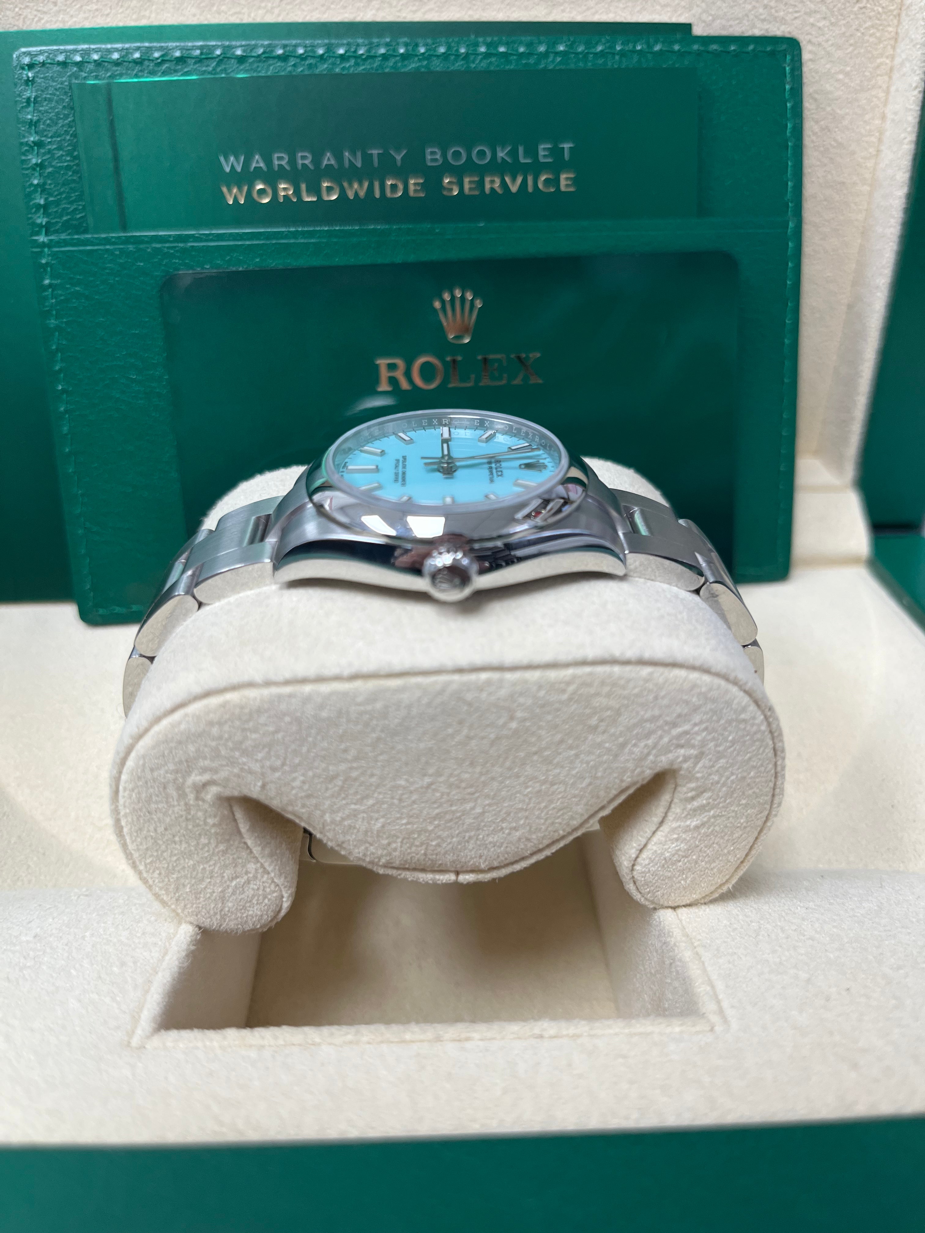 Rolex Oyster Perpetual 31mm Watch - Domed Bezel, Turquoise Blue Index Dial, Oyster Bracelet (Model 277200) | Luxury Women's Watch for Business, Parties & Special Occasions