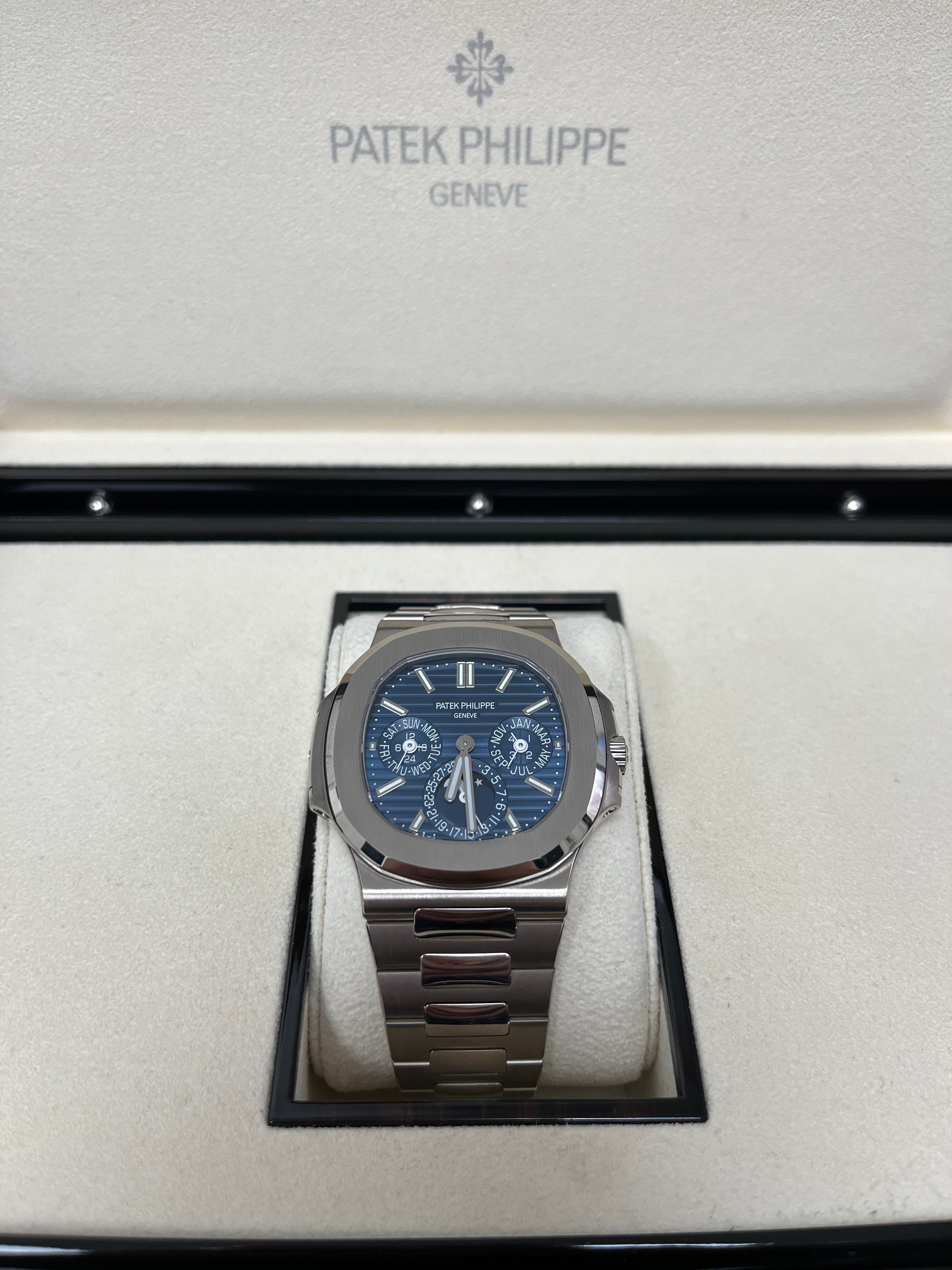 Patek Philippe Nautilus Perpetual Calendar Watch - 18K White Gold Case, Blue Sunburst Dial (Ref#5740/1G-001) | Luxury Swiss Timepiece for Men, Business Meetings & Special Occasions
