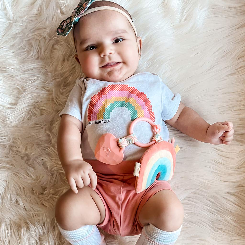 Itzy Ritzy Infant Toy & Teether - Silicone Baby Teething Toy with Lovey, Crinkle Sound & Textured Ribbons for Newborns (Rainbow) | Soothing Teether for Babies 0-12 Months, Perfect for On-the-Go & Nursery Playtime
