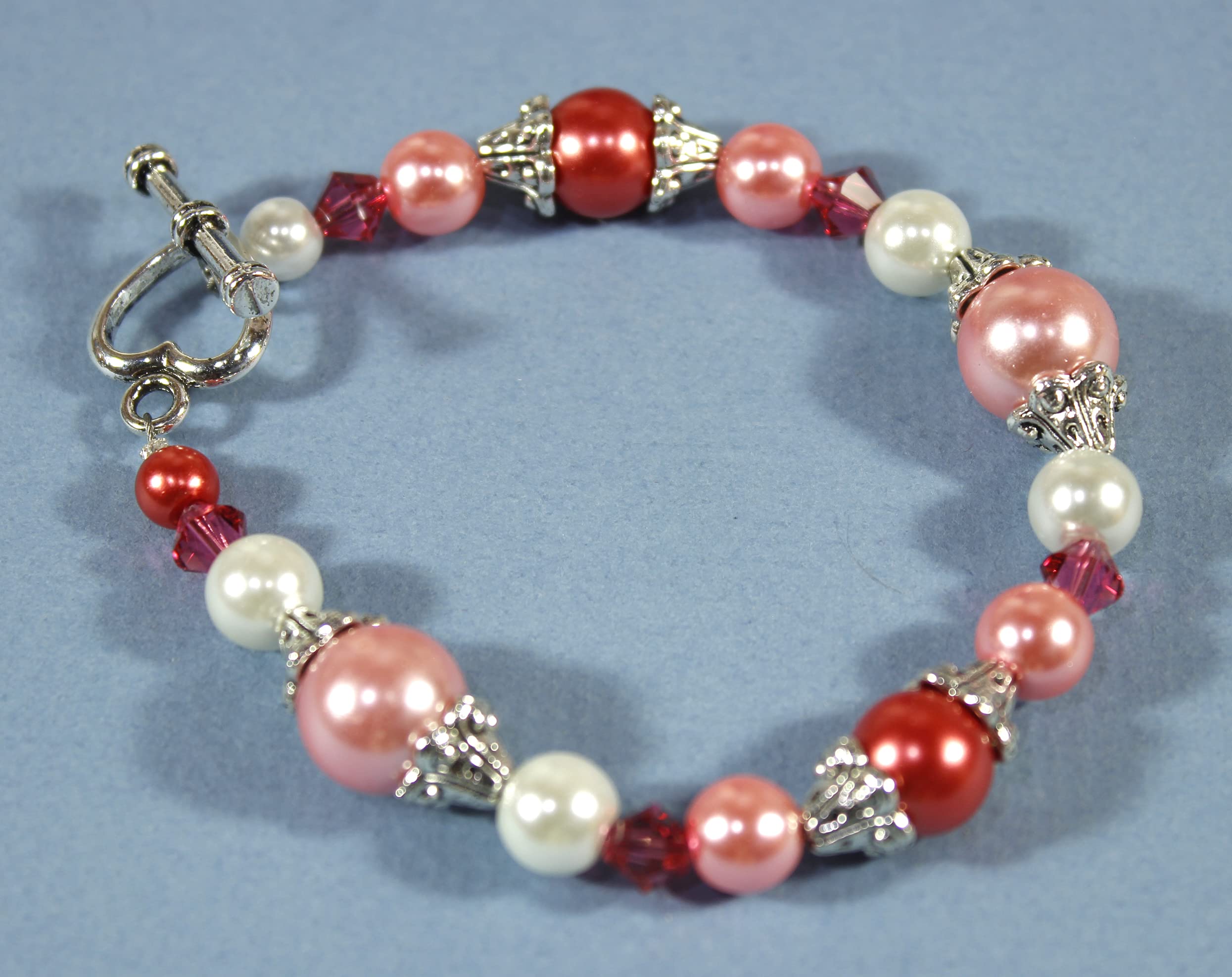 Elegant Pink Simulated Pearl Bracelet with Crystals for Parties