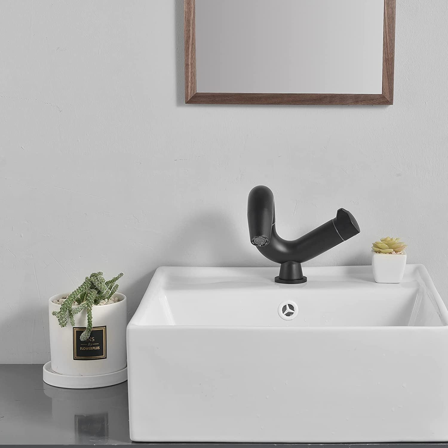 Modern Single Handle Bathroom Sink Faucet - 360° Swivel Spout, Solid Brass Construction in Matte Black - Perfect for Small Bathrooms, Powder Rooms & Vanity Makeovers