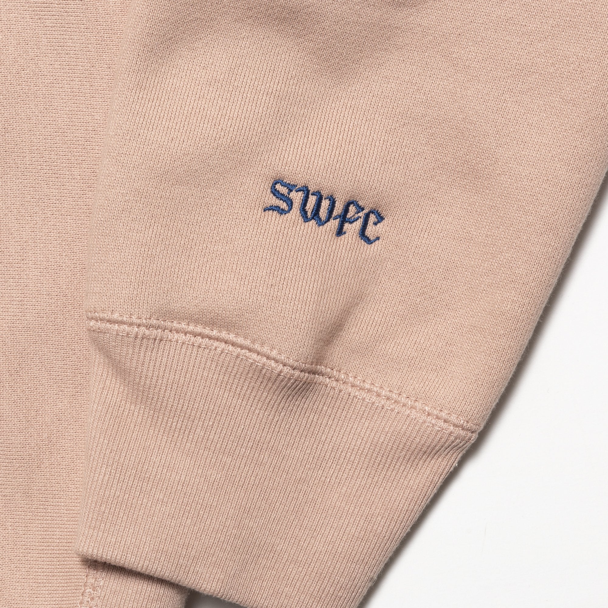 Chrystie NYC x Soho Warriors SWFC Twisted Logo Crewneck Sweatshirt - Light Pink | Streetwear Fashion for Urban Style & Casual Outfits