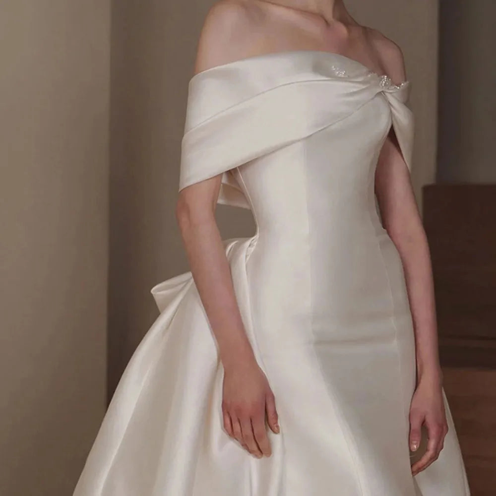 Elegant Off Shoulder Sweetheart Neck Beaded Bow Satin 2-Piece Mermaid Wedding Dress with Detachable Train - Perfect for Beach, Church, and Formal Wedding Ceremonies