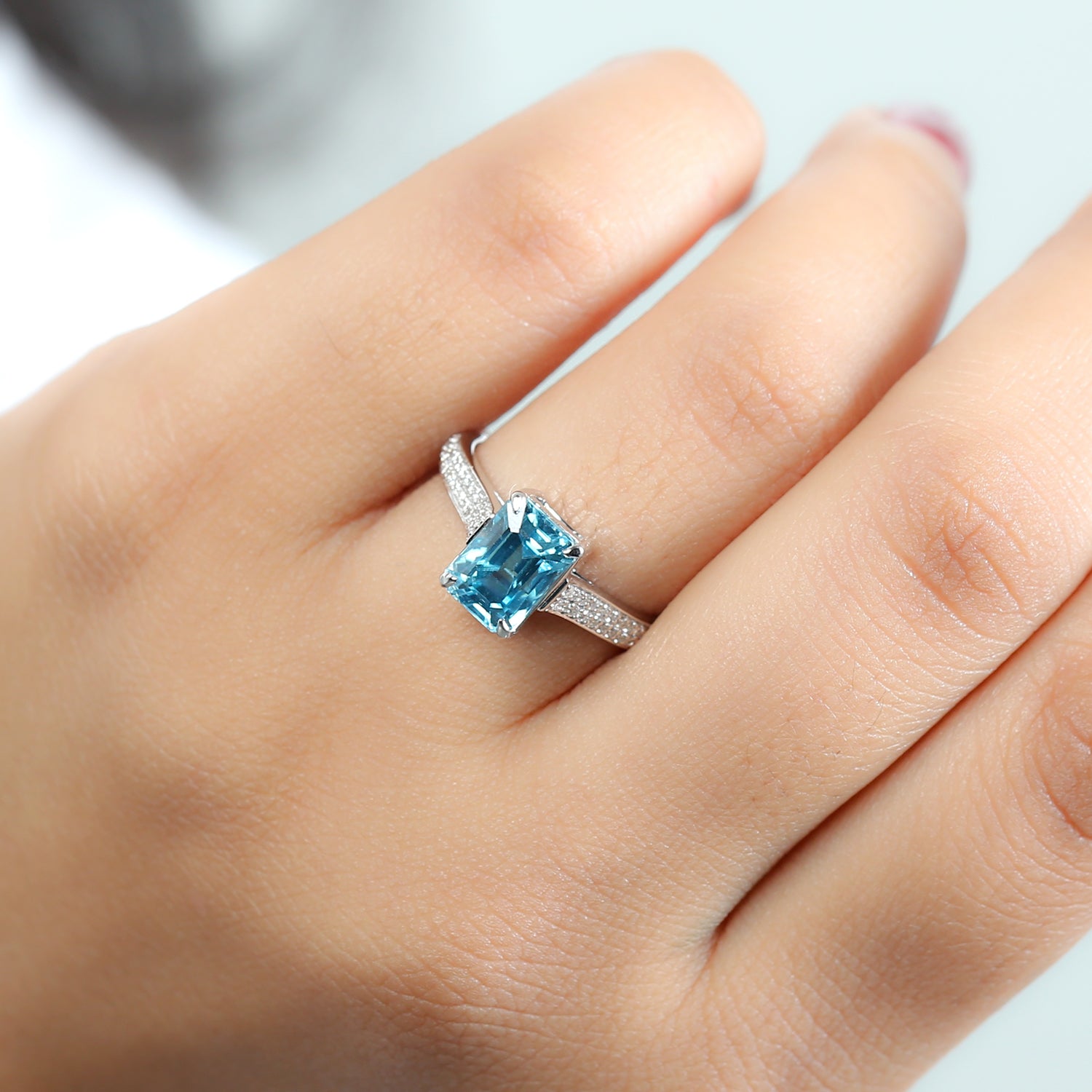 Exquisite 18K White Gold Baguette Cut Blue Zirconia Solitaire Ring with Pave Diamond Accents | Perfect for Engagement, Anniversary & Special Occasions