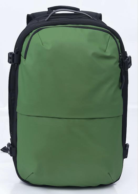 Travelite 17.3 Inch Vacuum Compression Travel Backpack with Hand Pump - Lightweight Green Carry-On Luggage for Airplane, Camping & Outdoor Adventures