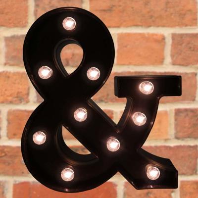 The Glowing Ampersand: A Symbol of Connection and Light