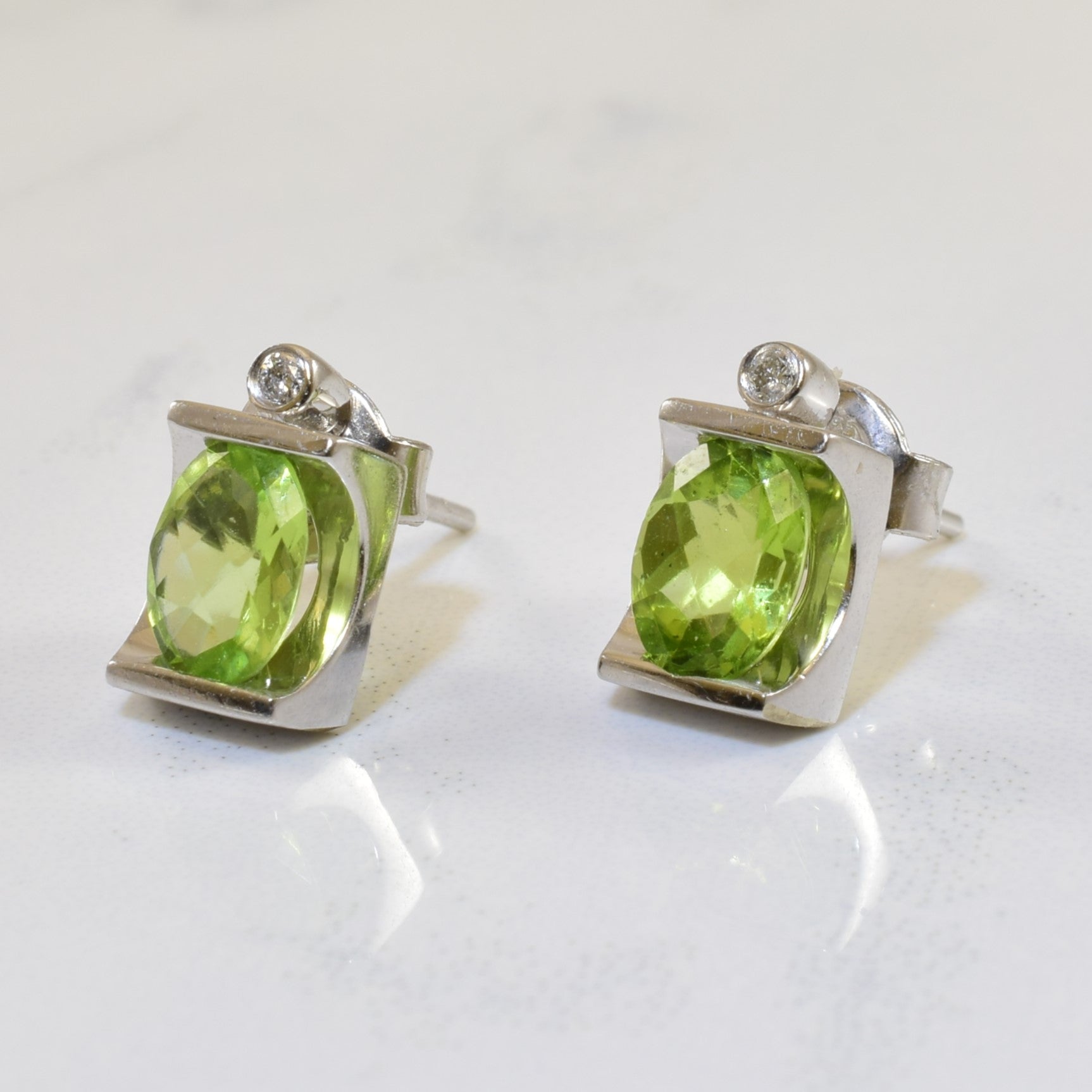 Peridot and Diamond Stud Earrings 1.40ctw Tension Set - 0.02ctw Sparkling Green Gemstone Jewelry for Women | Perfect for Weddings, Anniversaries & Special Occasions