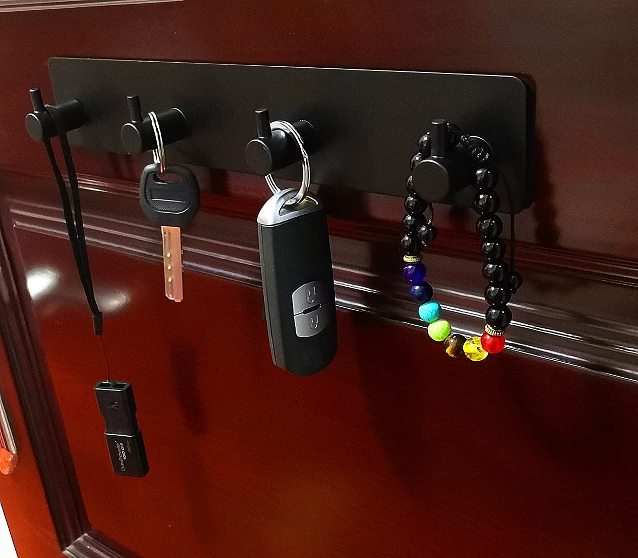 Stainless Steel Wall Mount Key Holder - 4 Hooks No Drill Adhesive Key Rack for Apartment Decor, Heavy Duty Key Organizer for Entryway, Kitchen & Bedroom - Black