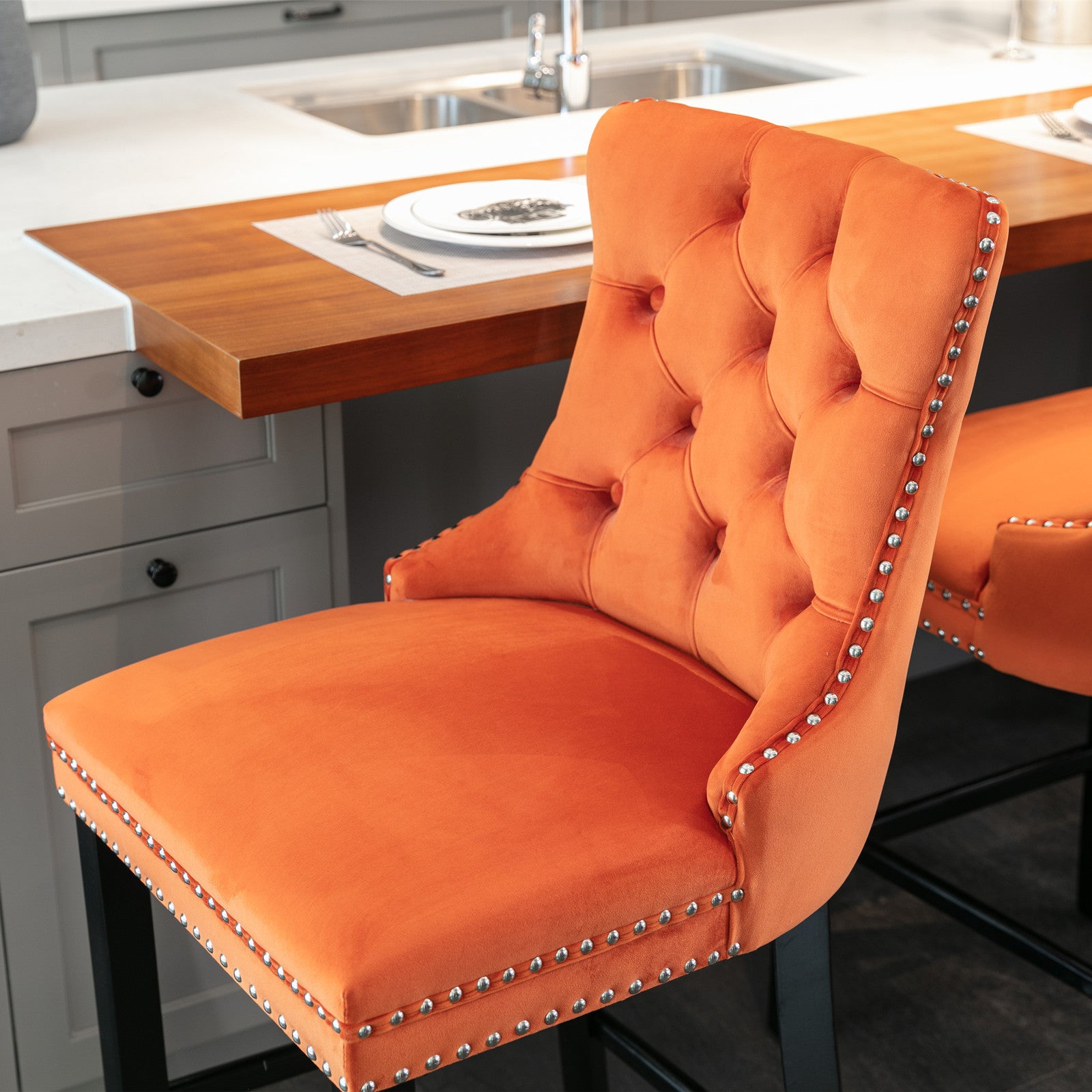 Luxury Velvet Bar Stools Set of 2 - Modern Button Tufted Bar Chairs with Wooden Legs & Chrome Nailhead Trim - Orange Upholstered Counter Stools for Kitchen Island, Home Bar & Dining Room Decor