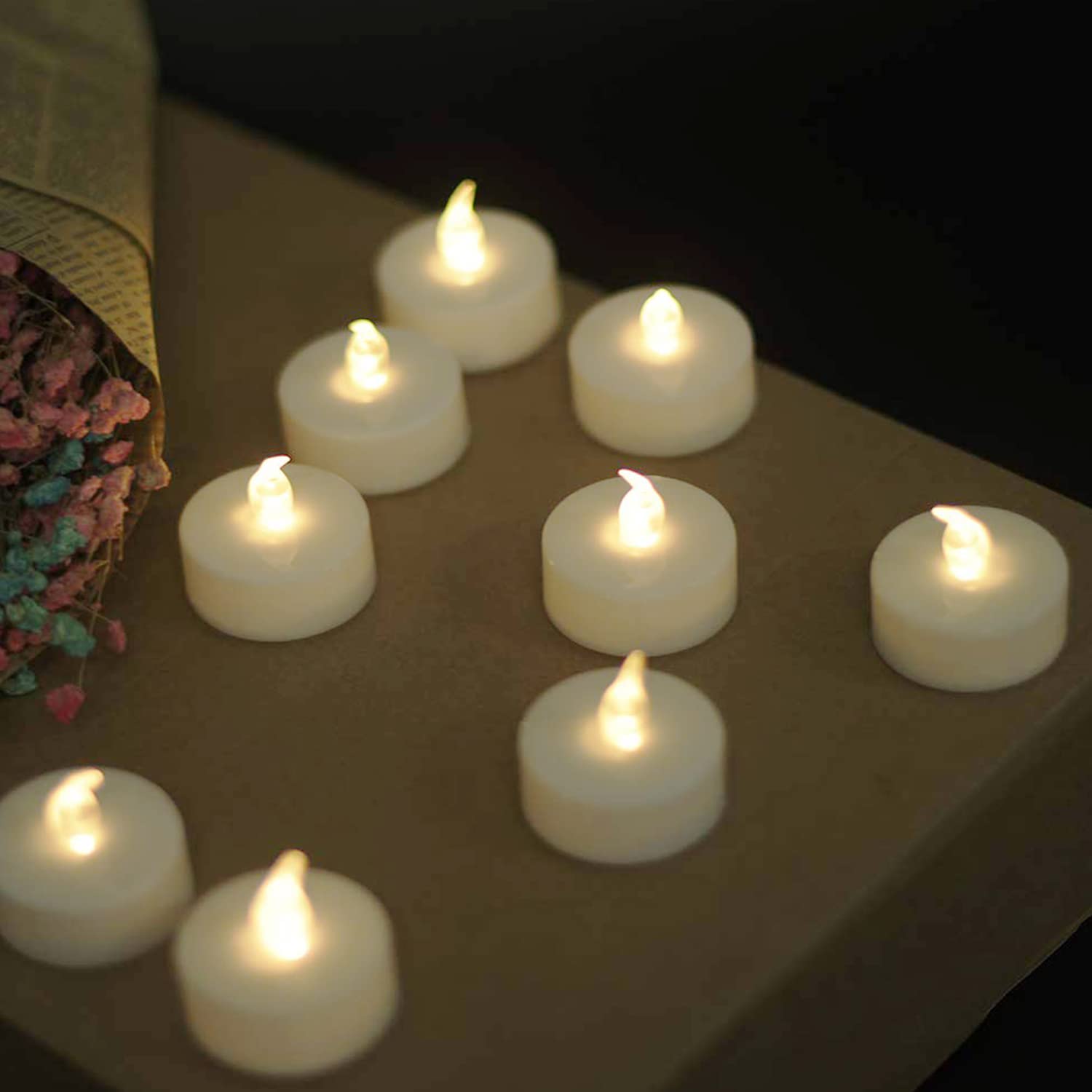 YIWER 12-Pack LED Tea Light Candles - 200 Hours Battery Operated Flameless Candles in Warm White for Weddings, Parties, Home Decor & Romantic Ambiance