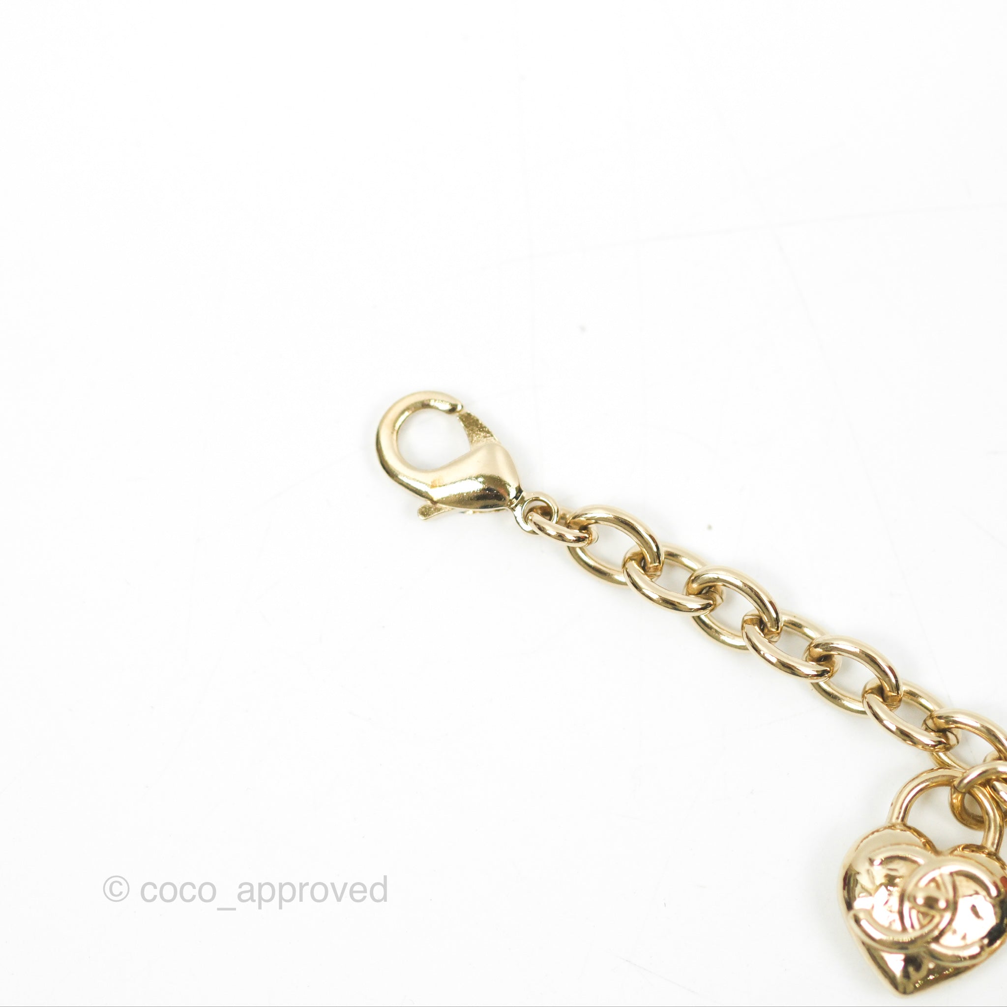 Chanel CC Heart Padlock Charms Chain Bracelet in Gold Tone - Elegant 22B Collection for Women | Perfect for Date Night, Parties & Special Occasions