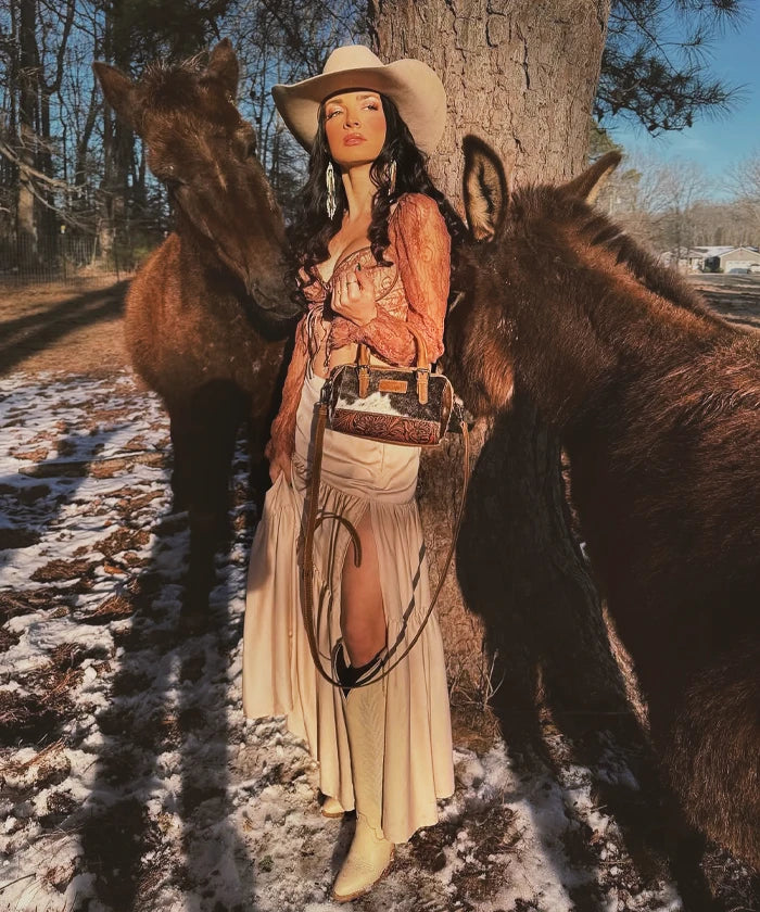 Wrangler Genuine Hair-On Cowhide Barrel Bag - Western Style Leather Crossbody Purse for Women | Perfect for Rodeo, Country Music Festivals & Everyday Use