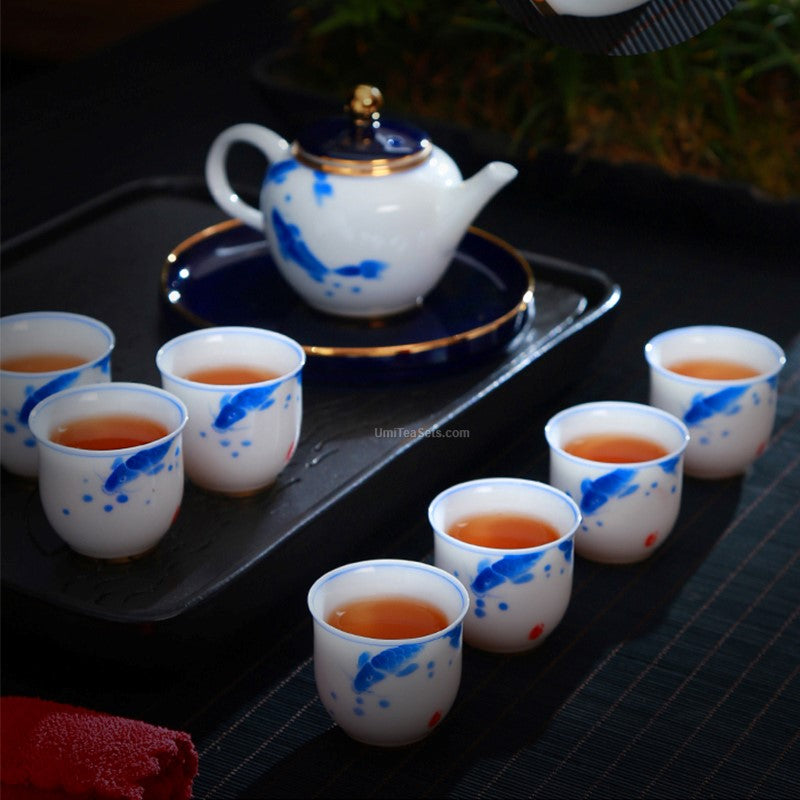 Hand Painted Blue and White Porcelain Goldfish Tea Set - Elegant Chinese Style Tea Cup, Saucer & Teapot for Afternoon Tea, Gift, or Home Decor
