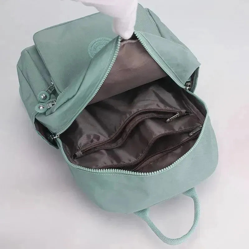 Waterproof Nylon Women's Travel Backpack - Lightweight Carry On Backpack for Airplane, Hiking & Outdoor Adventures