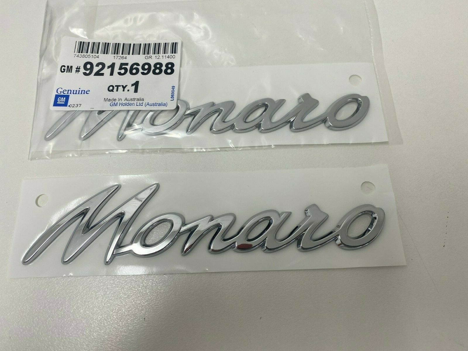Genuine Holden V2 VY 2002-2004 Monaro Quarter Panel Badge Pair (Part #92156988) - Perfect Replacement for Monaro Body Styling & Restoration Projects