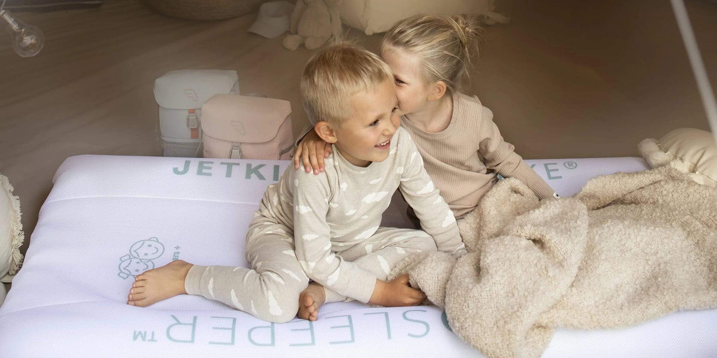 JetKids by Stokke CloudSleeper - Premium Kids Travel Pillow for Airplane & Car Rides | Comfortable & Portable Sleep Support for Toddlers on Long Trips