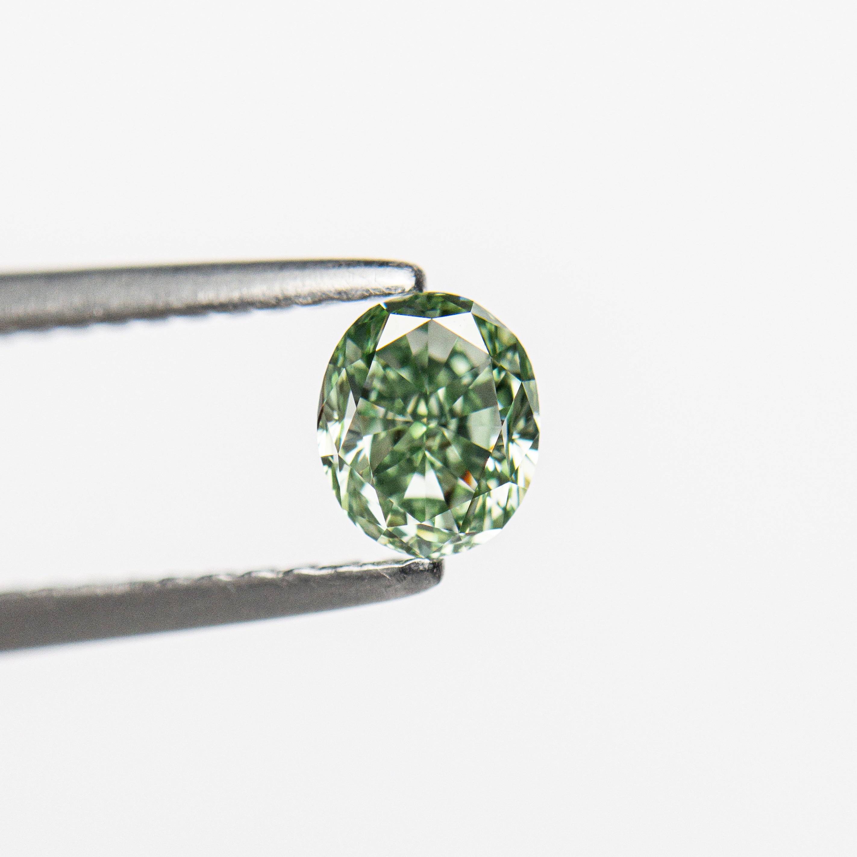 0.46ct GIA Certified VS2 Fancy Vivid Green Oval Cut Diamond - 4.71x3.96x2.93mm for Engagement Rings & Fine Jewelry