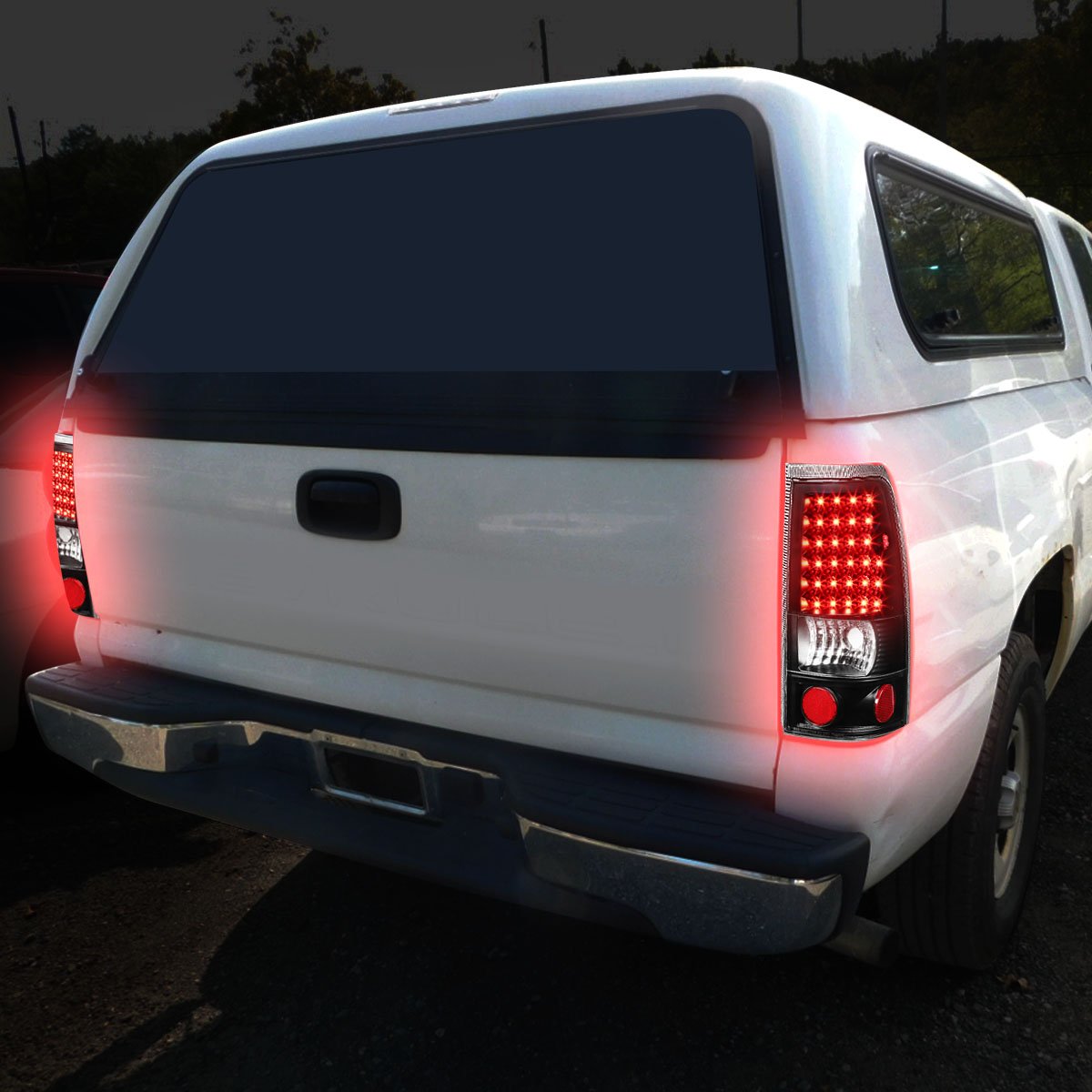 Auto Dynasty LED Tail Lights for 1999-2003 Chevy Silverado & GMC Sierra 1500/2500HD/3500HD - Black Housing Clear Lens Brake & Reverse Lamps (Pair) - Upgrade Your Truck's Style & Safety for Night Driving & Towing