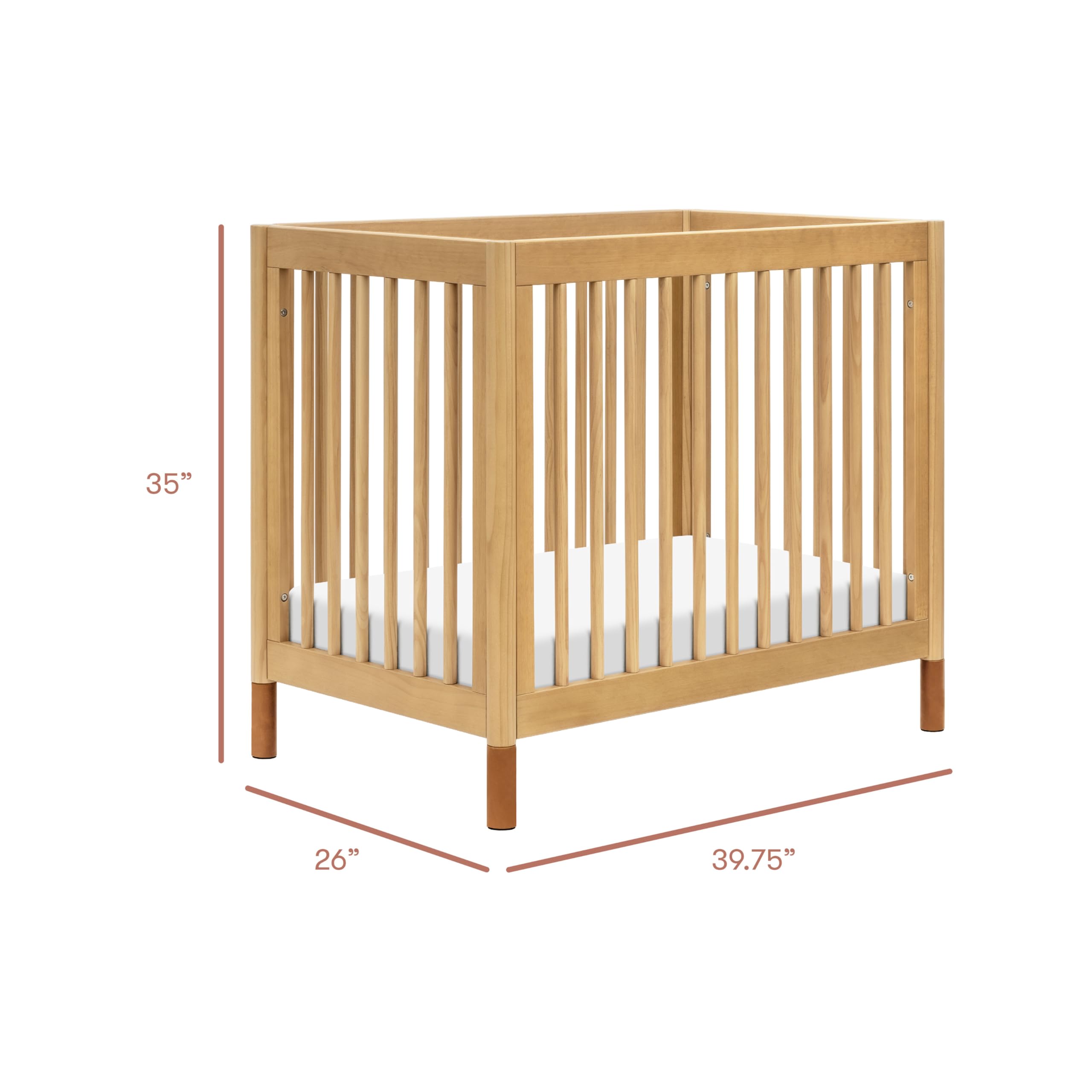 Babyletto Gelato 4-in-1 Convertible Mini Crib - GREENGUARD Gold Certified Wooden Toddler Bed, Daybed & Twin Bed with 4 Adjustable Heights - Space-Saving Nursery Furniture for Small Rooms - Honey Finish with Vegan Tan Leather - Ideal for Newborns, Infants & Toddlers in Apartments or Shared Bedrooms