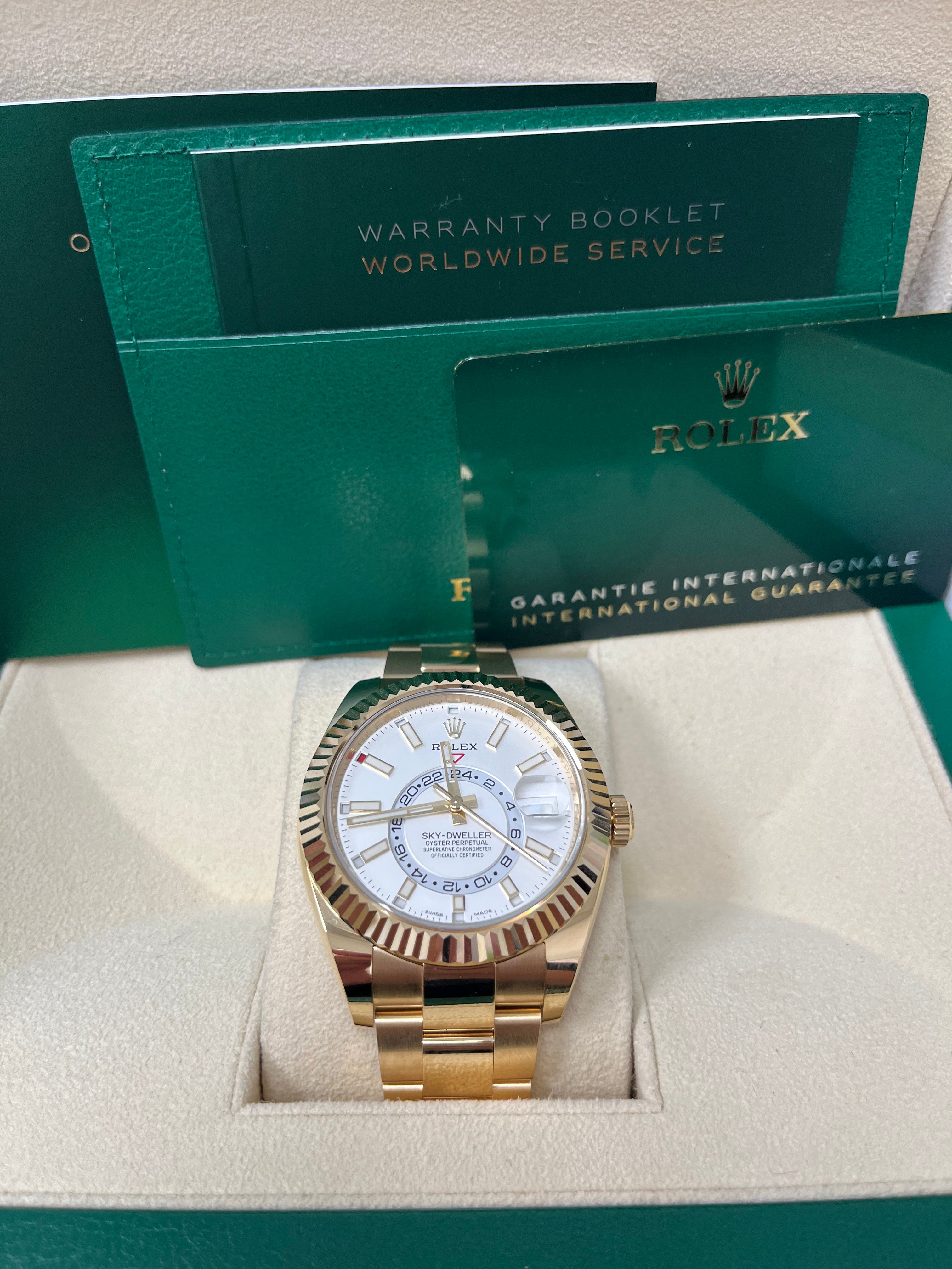 Rolex Sky-Dweller Yellow Gold Watch with White Dial & Oyster Bracelet (Ref# 326938) - Luxury Timepiece for Business Travelers & Watch Collectors