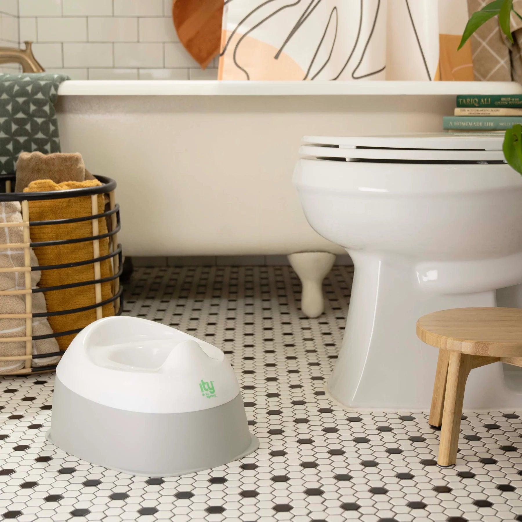 Ingenuity Ready Set Go Potty Training Seat for Babies & Toddlers - Easy-to-Clean, Comfortable & Portable Potty Chair for Boys & Girls - Perfect for Home, Travel & Daycare Use