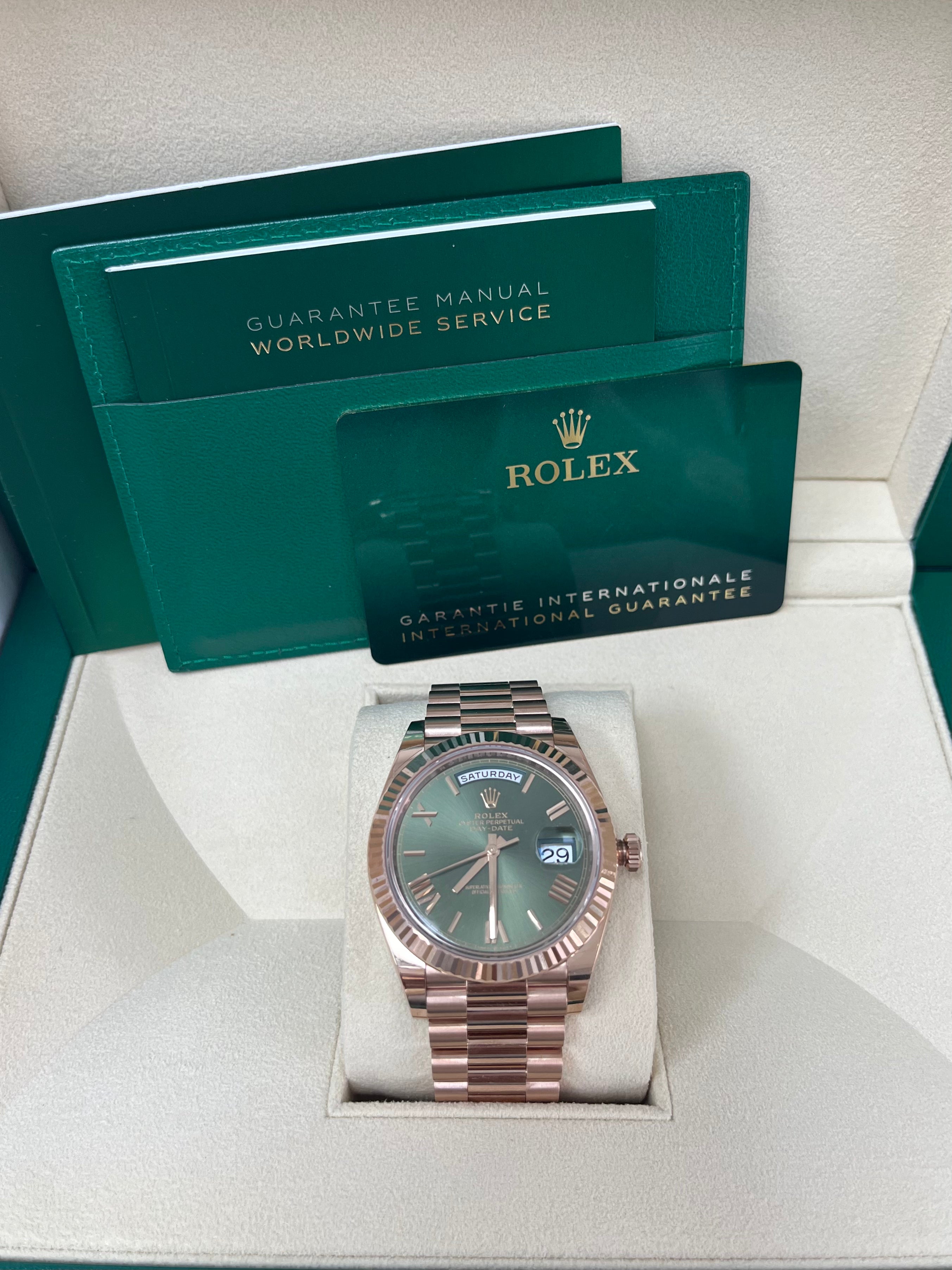 Rolex Day Date 40 Rose Gold Watch with Green Roman Dial & Fluted Bezel (Ref#228235) - Luxury Dress Watch for Business & Formal Occasions