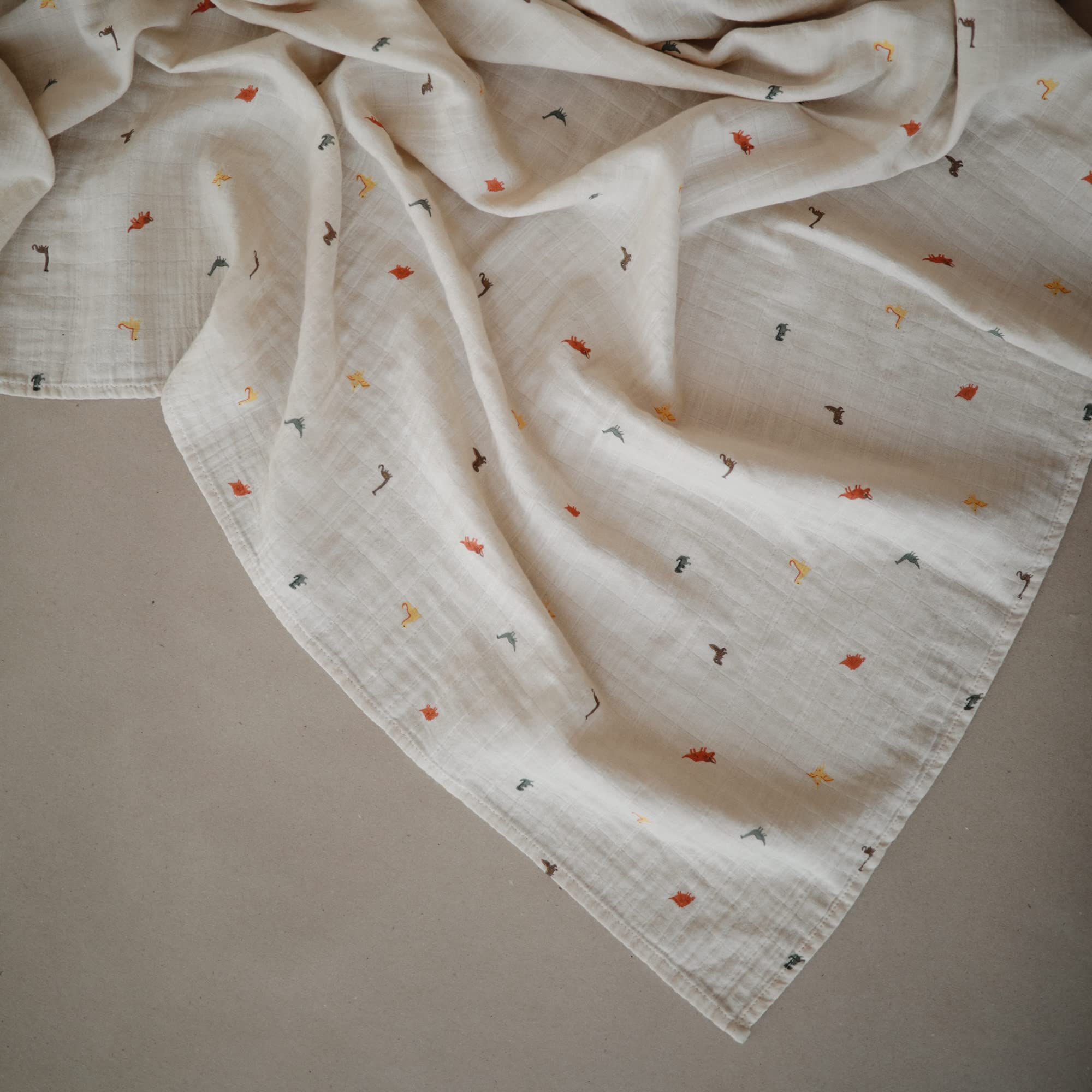 Organic Cotton Muslin Baby Swaddle Blanket with Dinosaur Print - Soft & Breathable for Newborns & Infants - Perfect for Swaddling, Nursing Cover, Stroller Blanket & Tummy Time