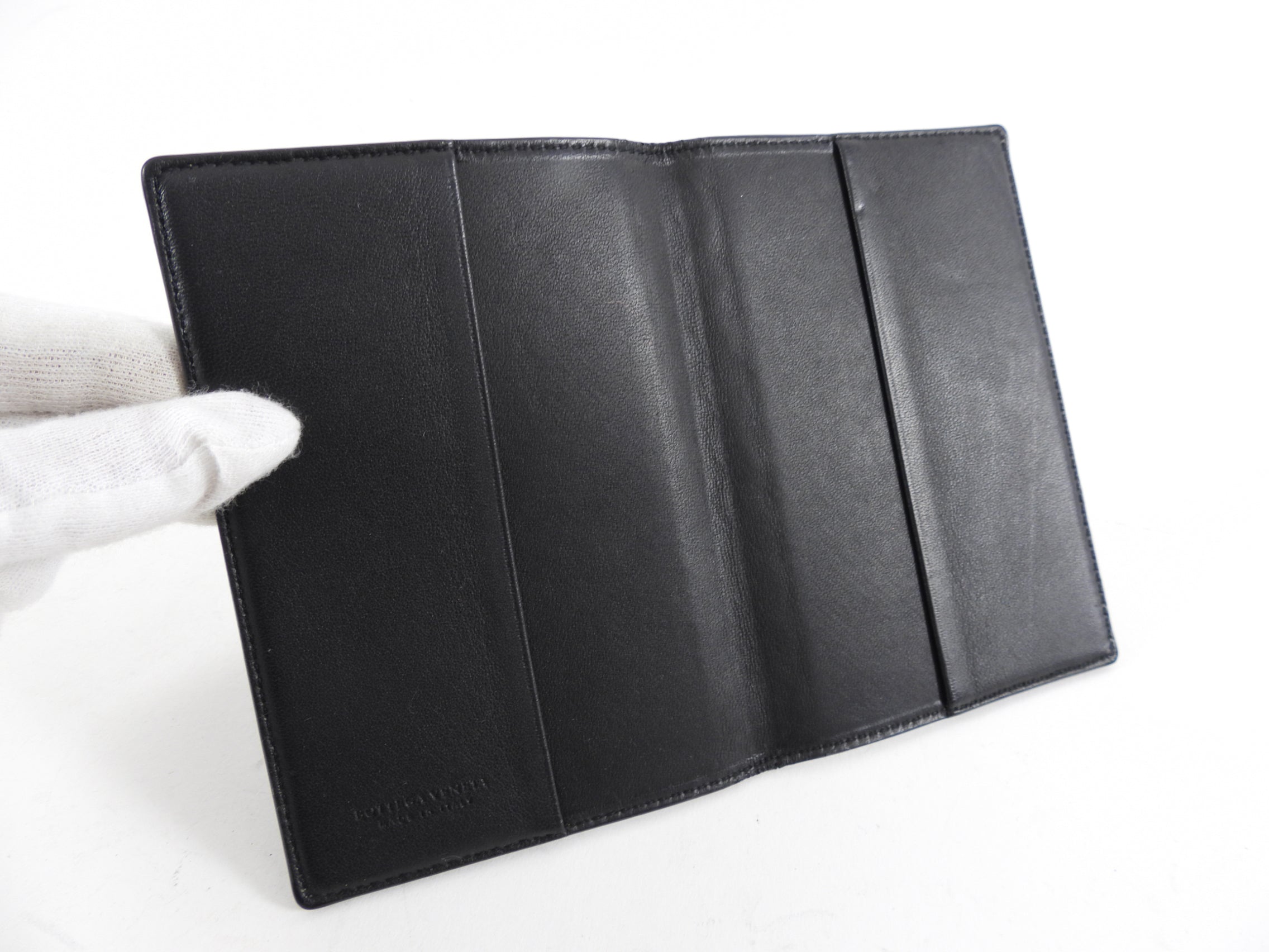 Bottega Veneta Black Intrecciato Leather Passport Wallet - Luxury Travel Accessory for Men & Women, Perfect for Airports and International Trips