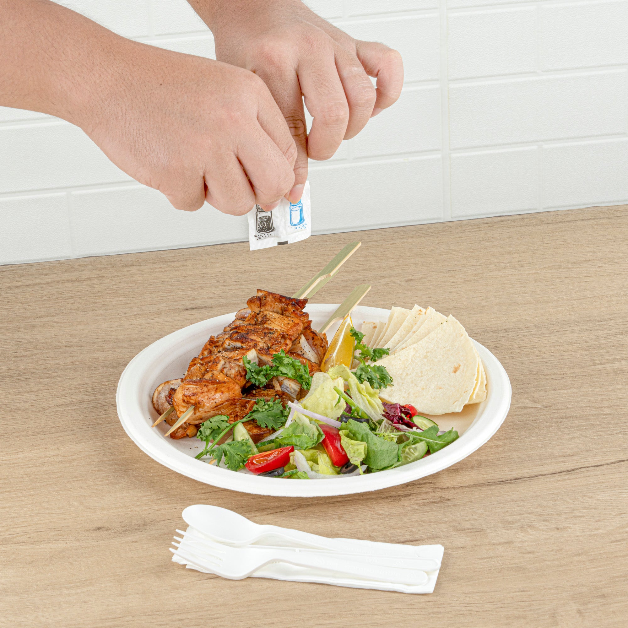 Eco-Friendly White PLA Compostable Cutlery Set with Napkins & Salt/Pepper Packets - 500 Count Bulk Box (6.25