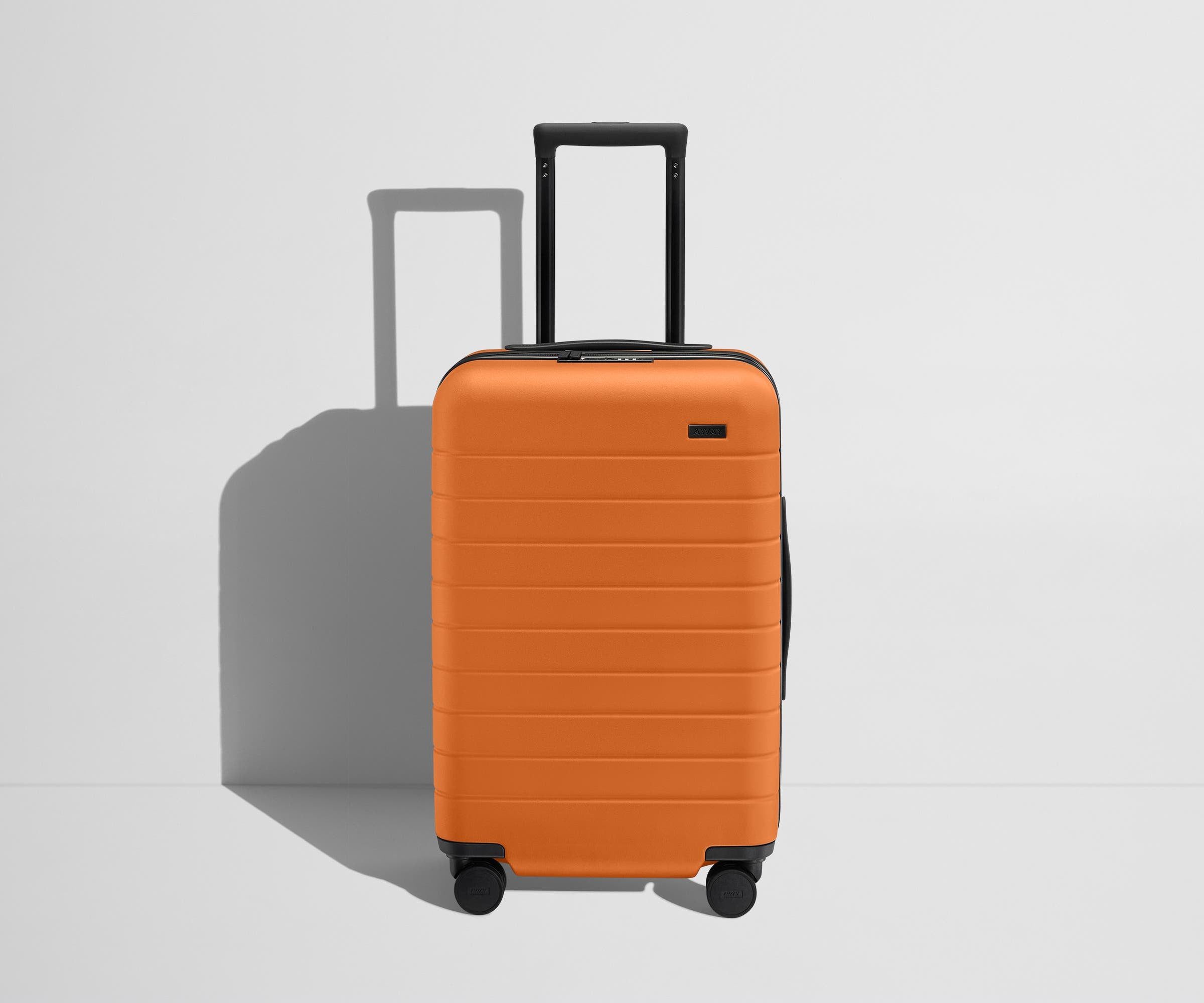 The Carry On Flex in Sorbet Orange - Lightweight Expandable Suitcase for Travel, Business & Weekend Getaways | Perfect for Airplane Cabin & Road Trips