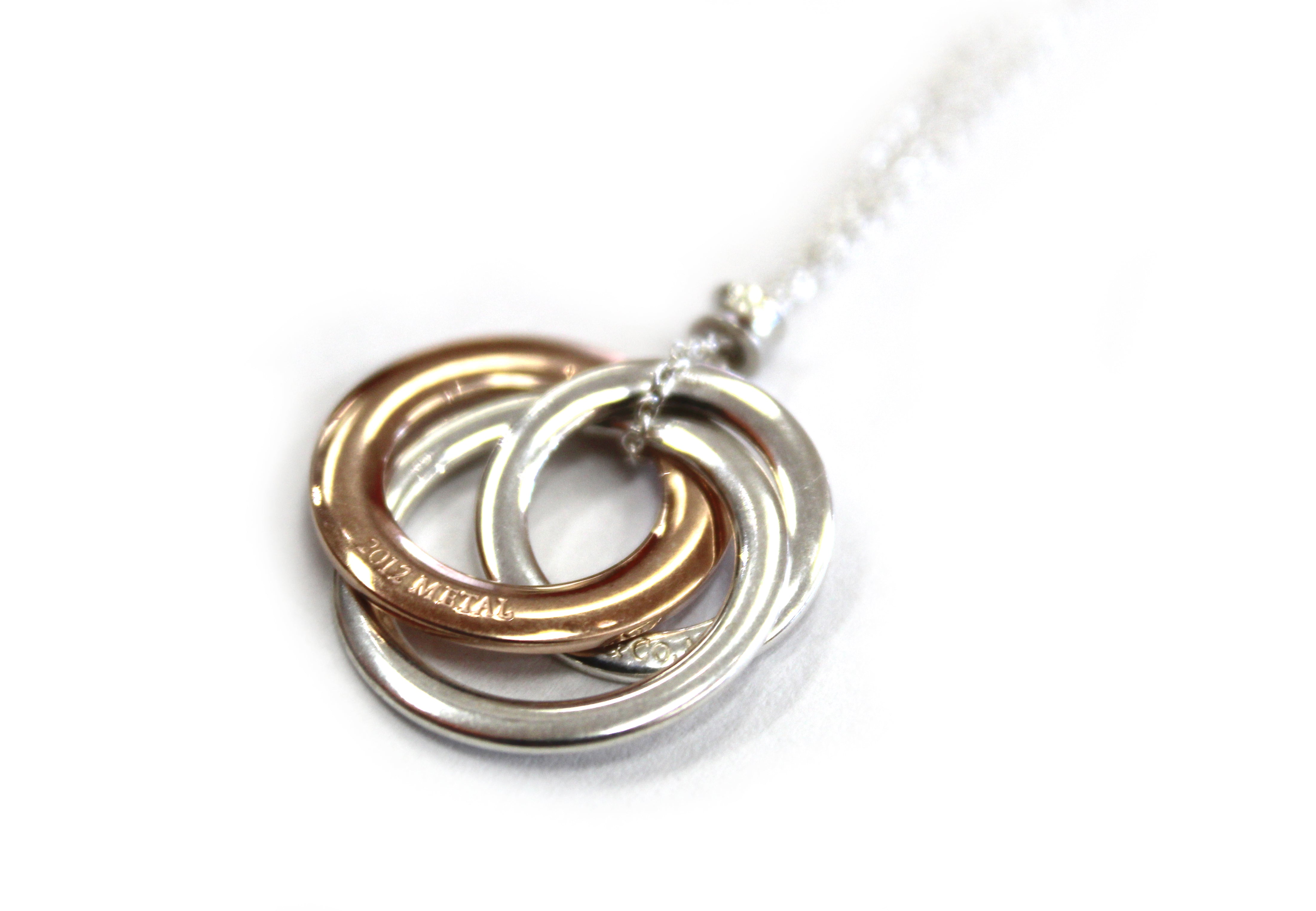 Authentic Tiffany & Co. 1837 Interlocking Circles Rubedo & Silver Pendant Necklace - Elegant Jewelry for Women, Perfect Gift for Anniversary, Valentine's Day & Special Occasions