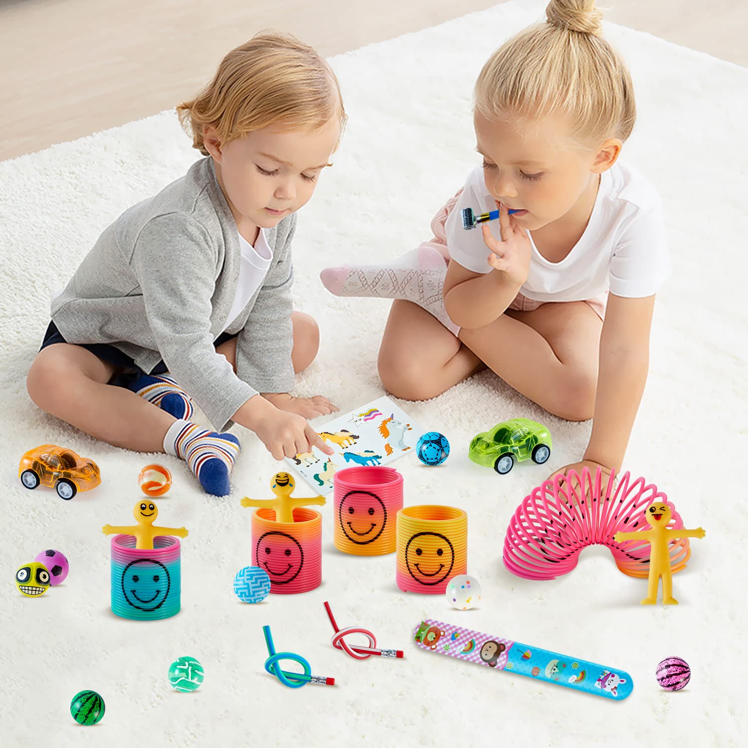 SMOKFON Kids Party Favor Bag Fillers - Assorted Toys Including Rainbow Springs, Slap Bracelets, Bouncy Balls & Temporary Tattoos - Perfect for Birthday Parties, Classroom Rewards, Stocking Stuffers & School Prizes - Fun Gift for Boys & Girls