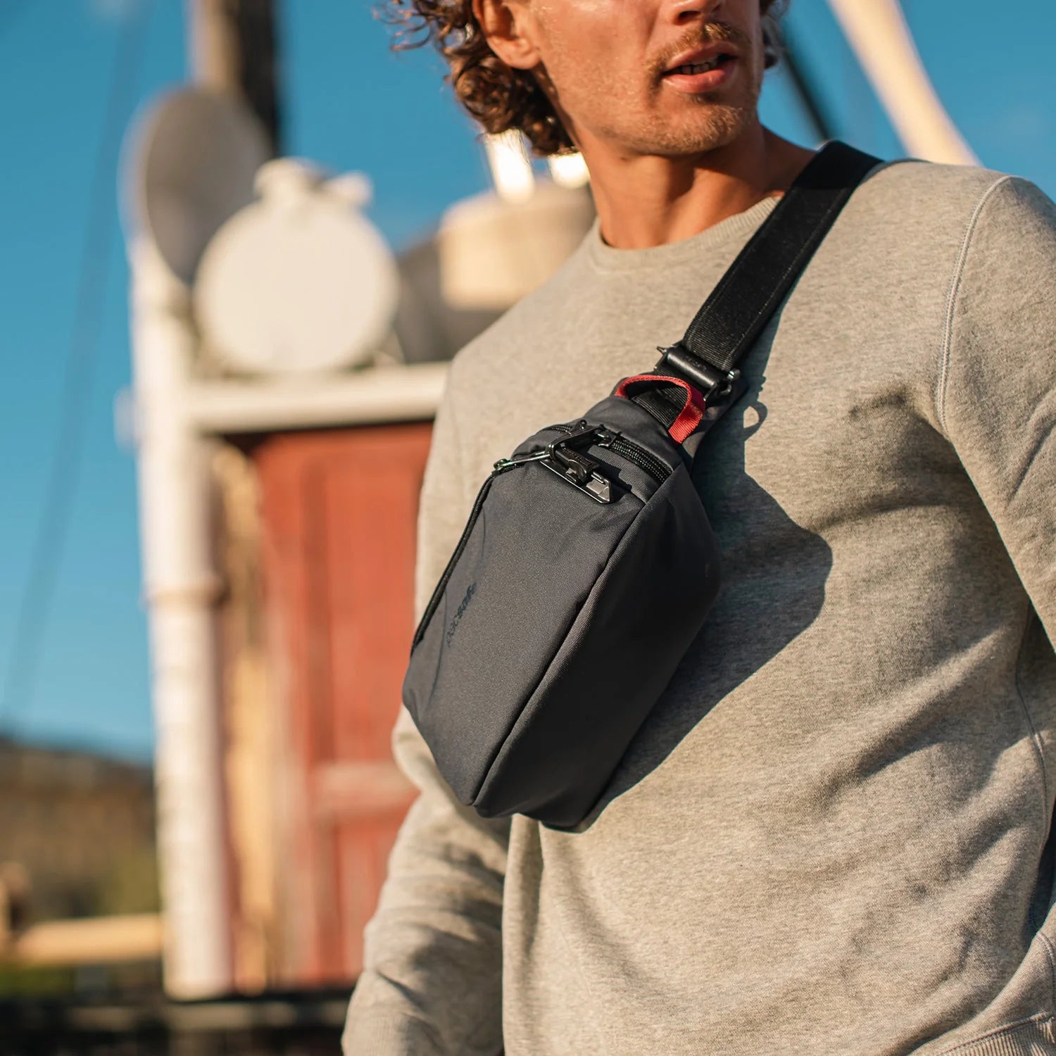 Pacsafe Vibe 100 Anti-Theft RFID Blocking Waist Pack for Travel, Hiking & Daily Use - Secure Crossbody Bag with Cut-Proof Straps for Men & Women
