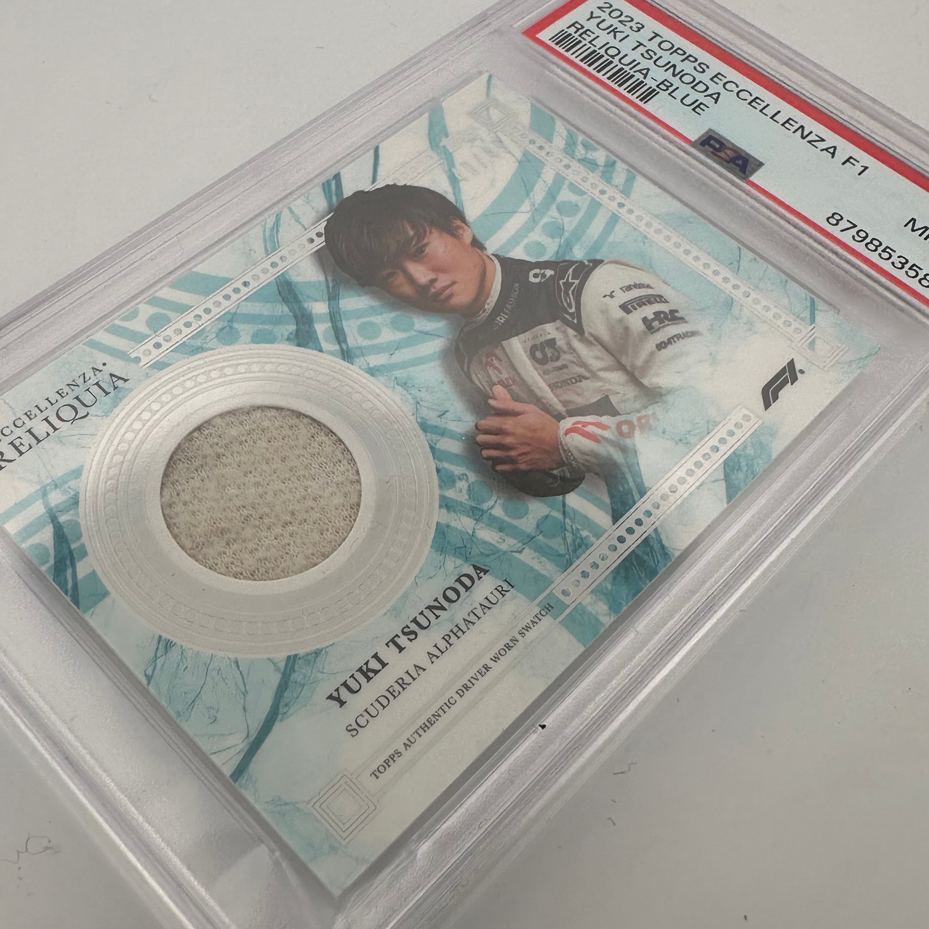 1/1 Gold + Complete Rainbow Yuki Tsunoda 2023 Eccellenza Reliquia (PSA9/10) - Rare Collectible Trading Card for Sports Memorabilia & F1 Racing Fans