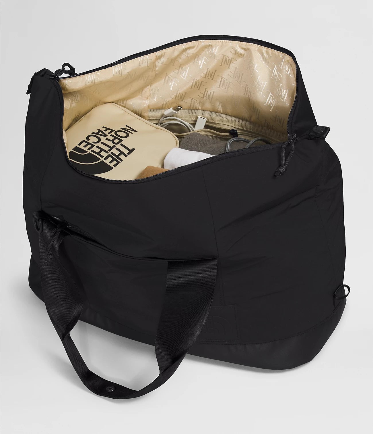 The North Face Women's Never Stop Weekender Duffel Bag - Large Travel Duffel for Gym, Workout, Yoga & Weekend Trips - Durable & Water-Resistant Carryall for Women