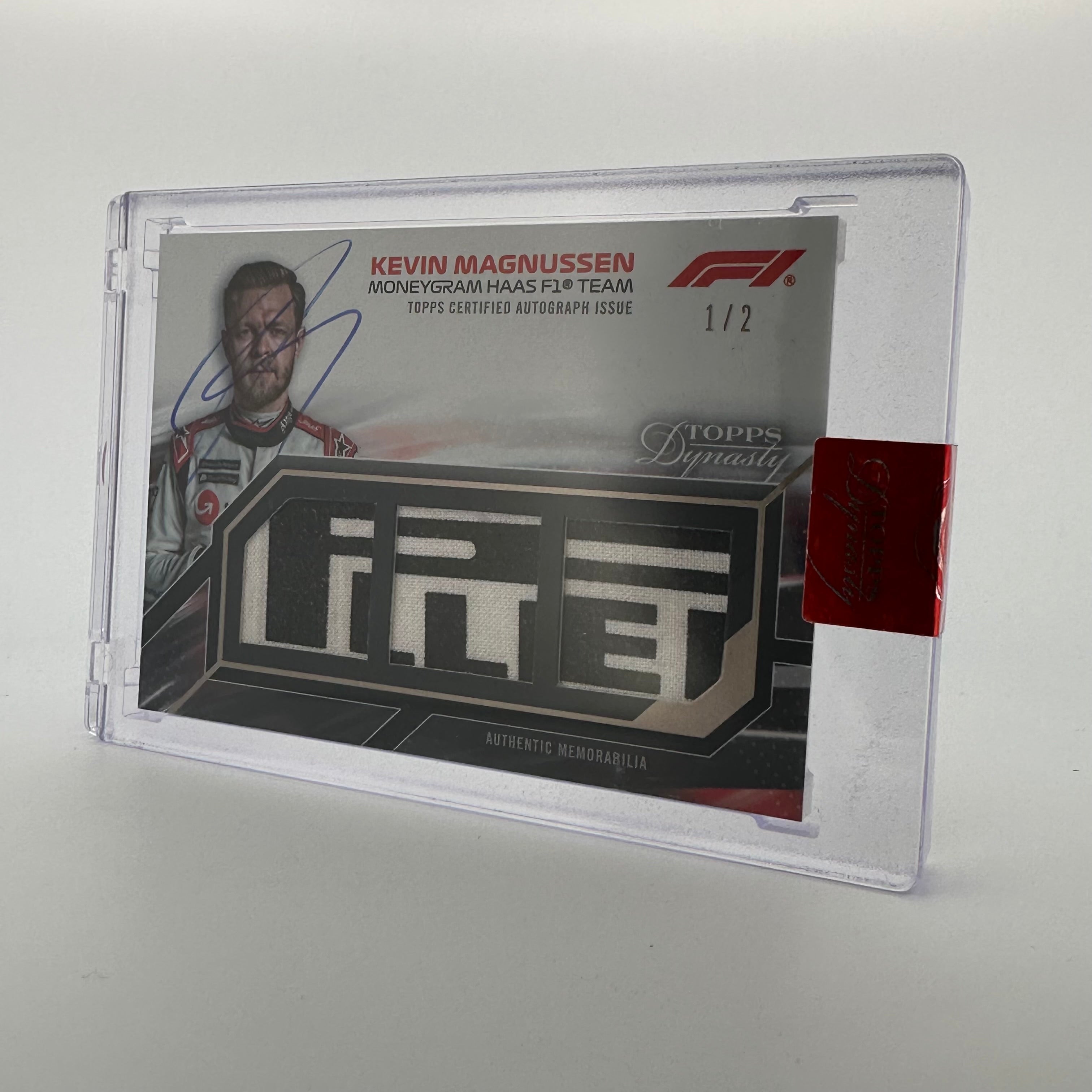 2023 Topps Dynasty F1 Kevin Magnussen #SDTRA KMII Triple Relic Autograph Card - Collectible Memorabilia for F1 Fans and Sports Card Enthusiasts