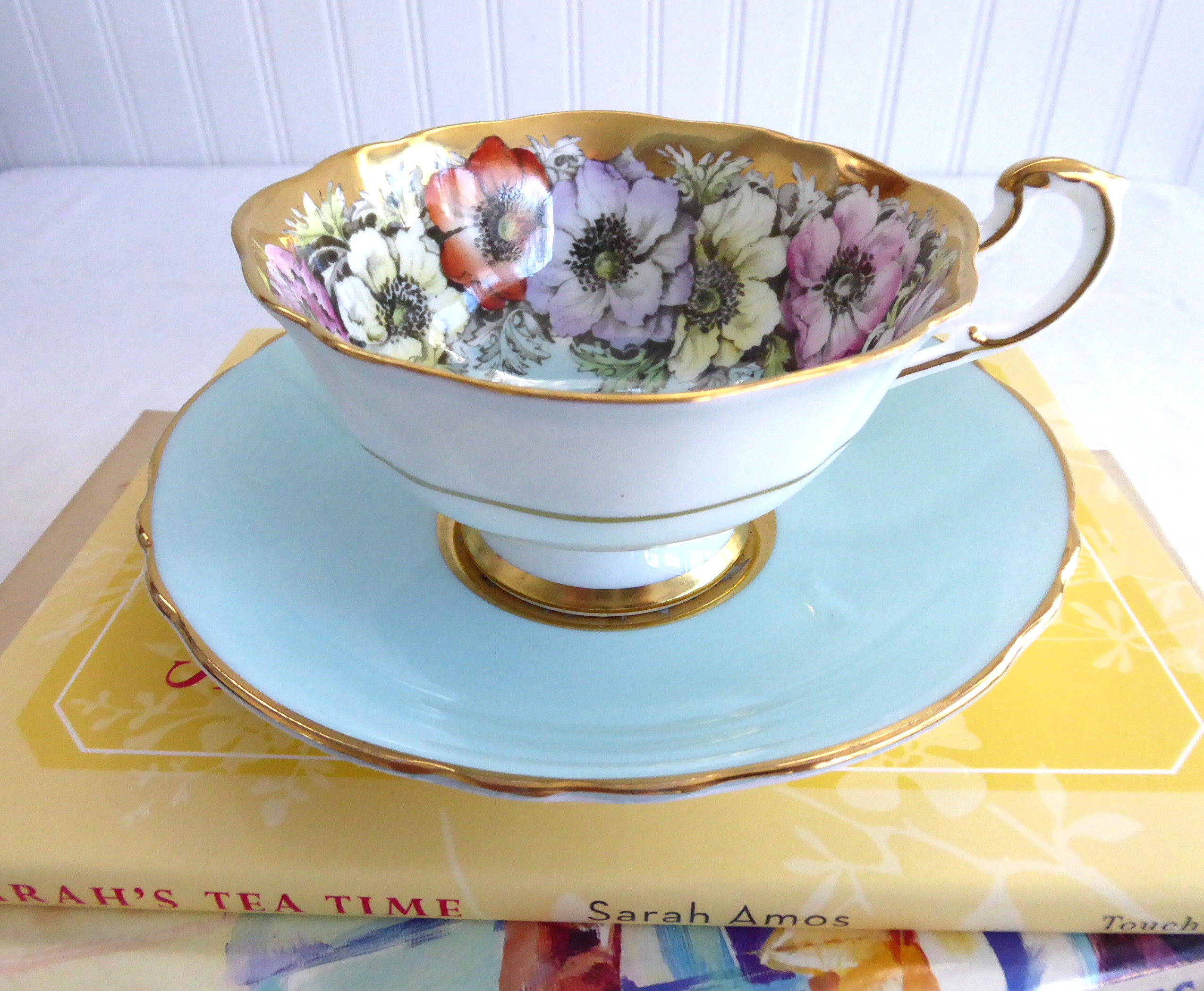 Vintage Paragon Cup and Saucer Set - Luxe Gold Trim with Aqua Poppies Design, Queen Elizabeth Warrant 1950s - Perfect for Afternoon Tea, Collectible China Display, and British Royalty Memorabilia